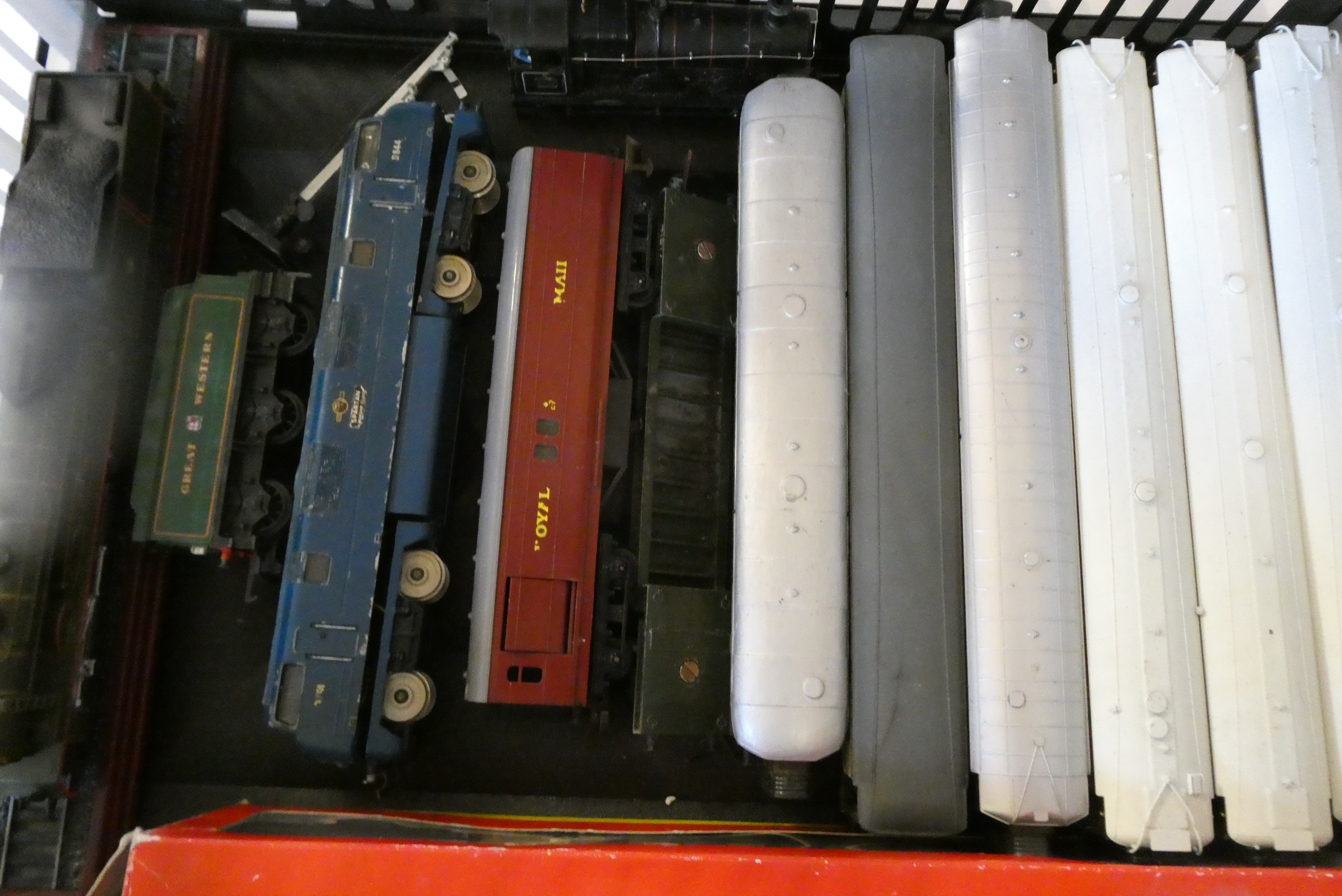 Unboxed trains by Hornby and others including diesel locomotives, goods trucks and passenger Image
