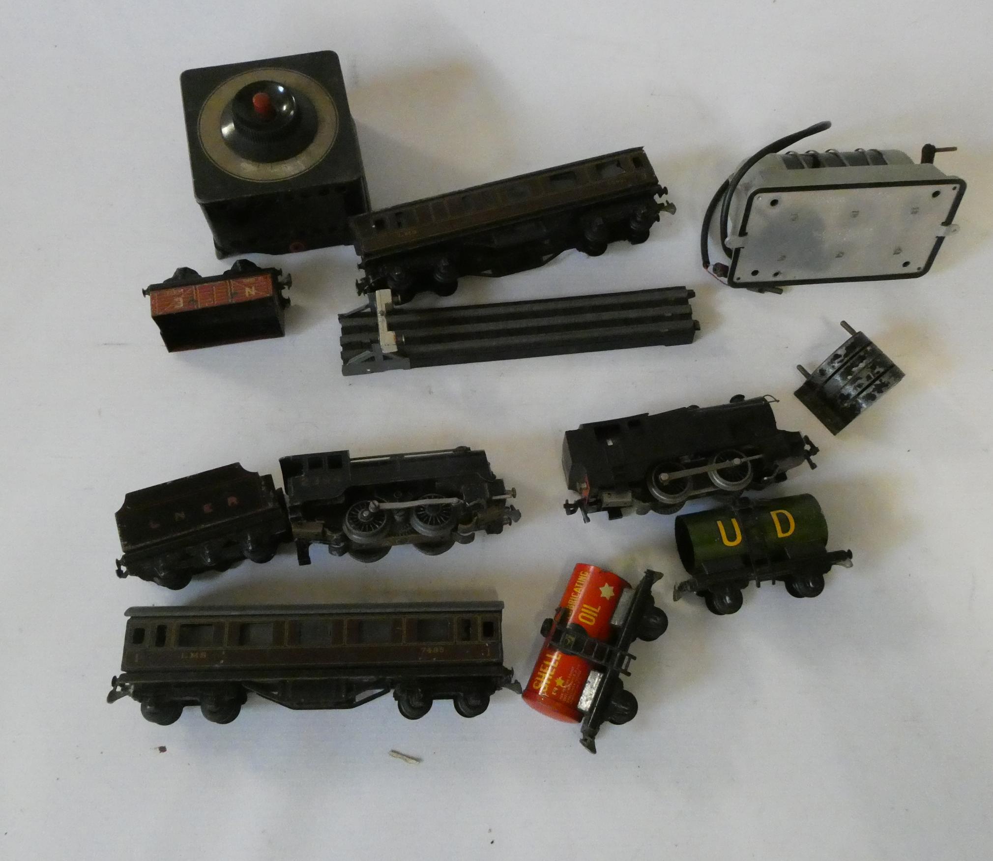Playworn Trix Twin models including two locomotives, wagons and speed controller, poor (Est. plus Image