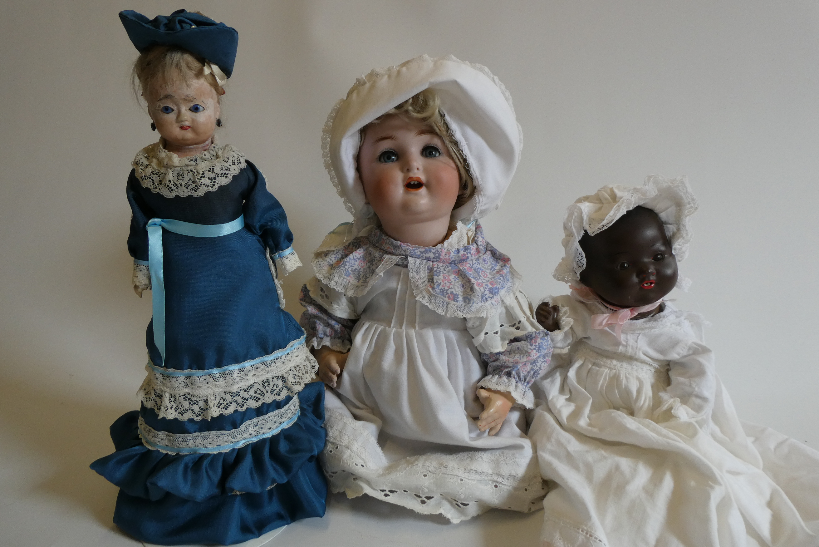 Three antique dolls Image