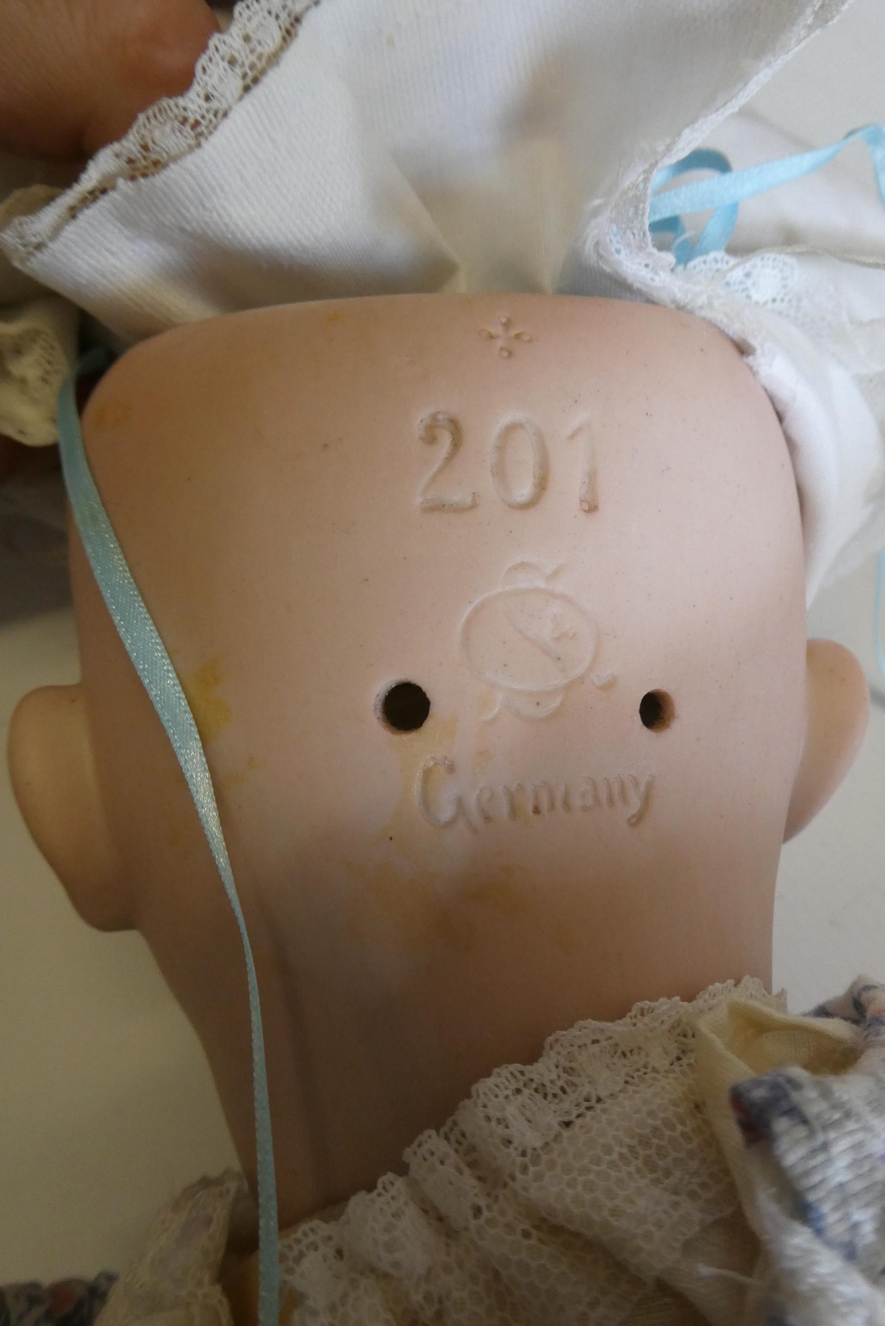 Three antique dolls Image