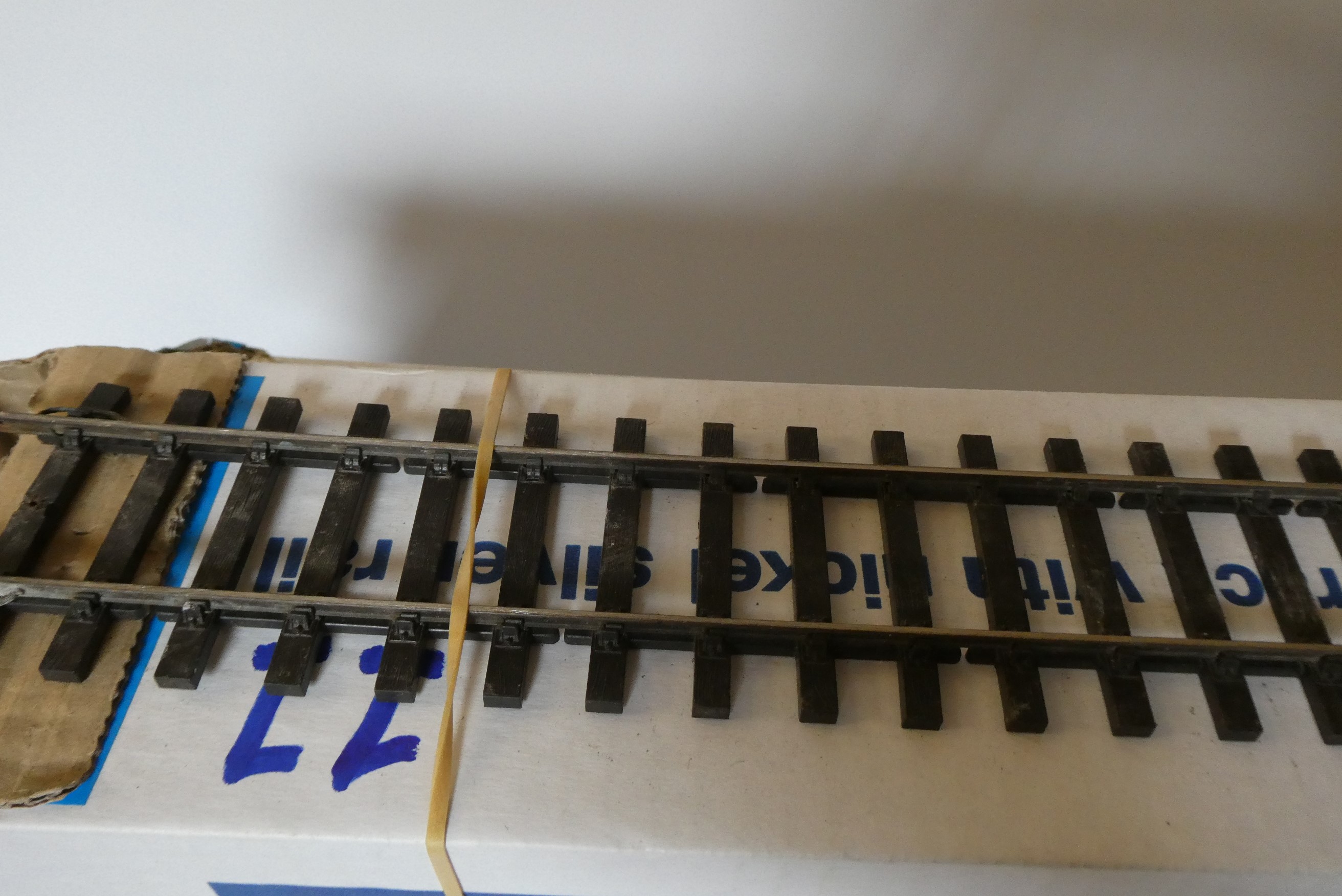 Sixty eight lengths of used PECO fine scale SL700 Gauge 0 flexible track. This track has been Image