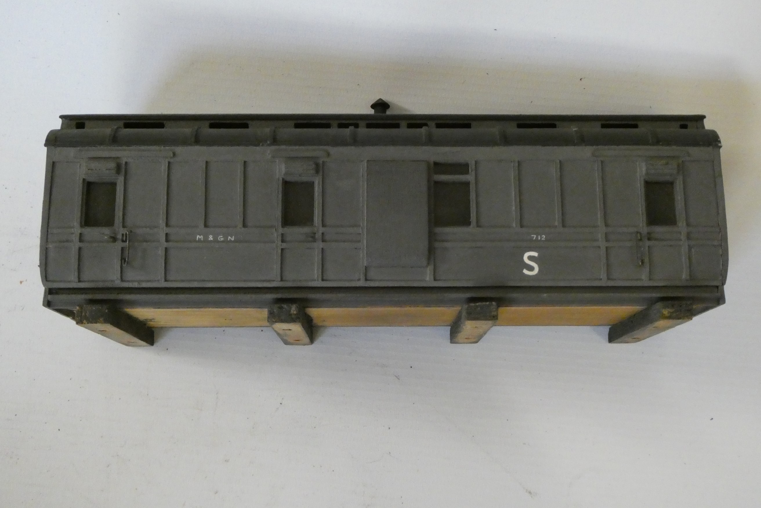 Nine well made course scale O gauge semaphore signals including single post and bracket signals and Image