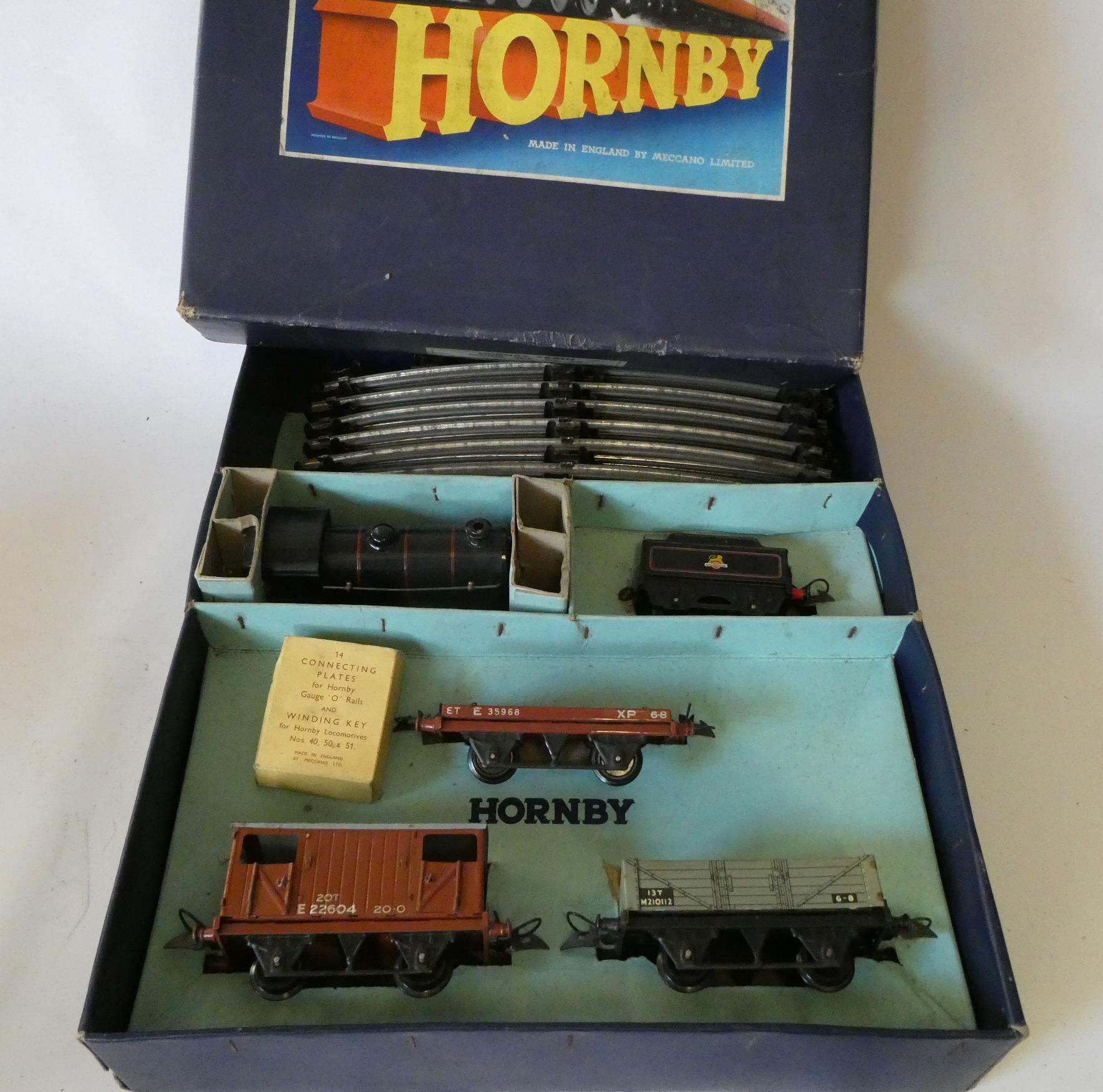 Hornby clockwork Goods set No 50 with British rail locomotive and three goods trucks Image