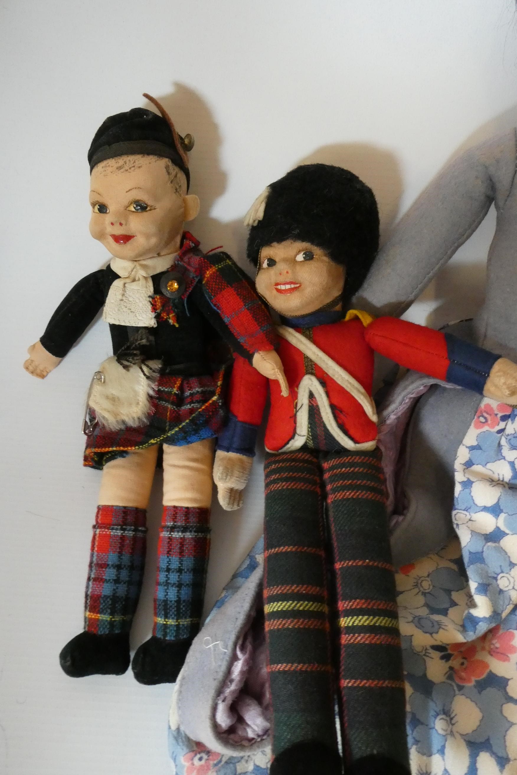 Three Norah Wellings dolls, comprising a 12" South Sea Island doll, 11" Beefeater and a 10" Image