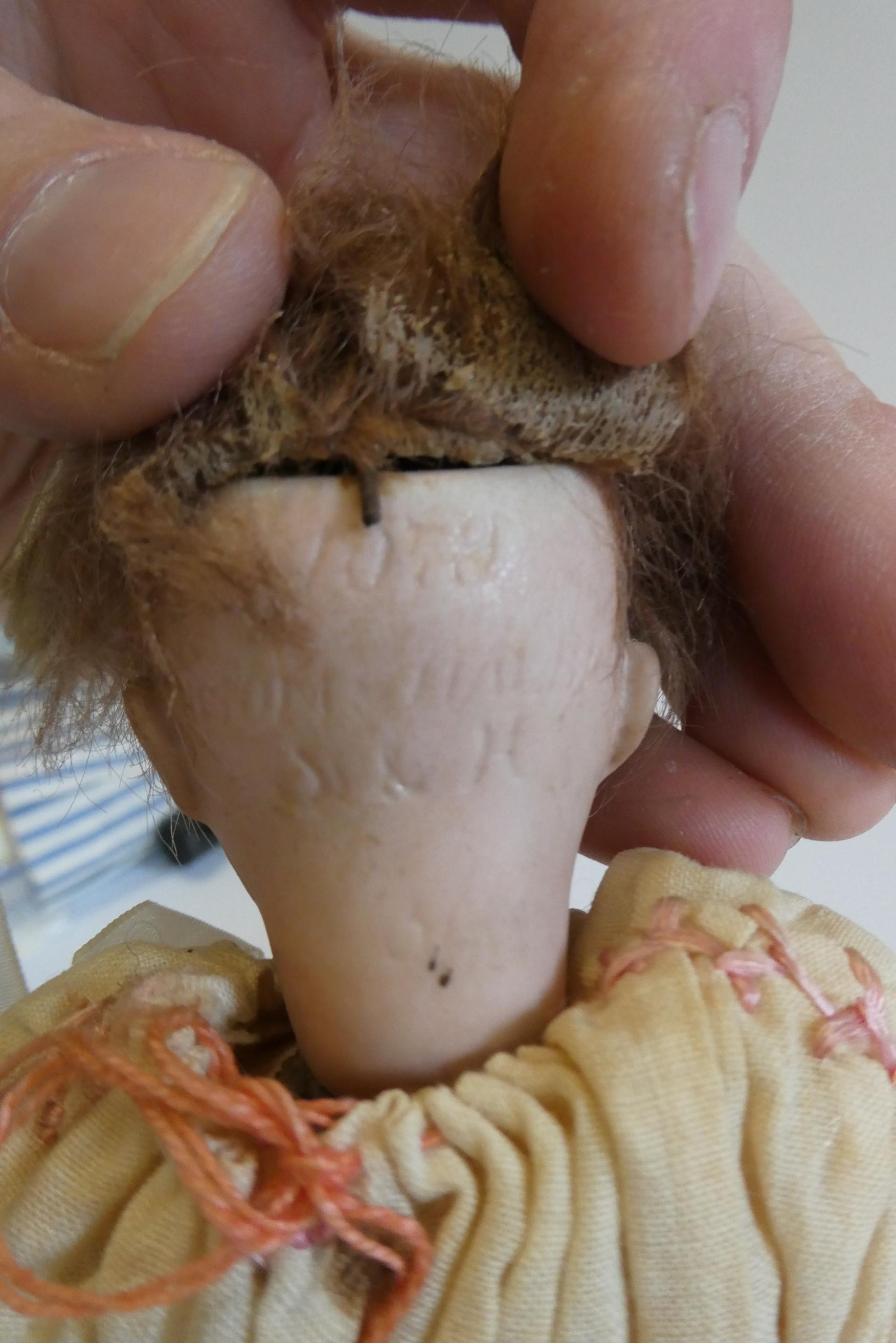 A Simon & Halbig bisque socket head doll Image