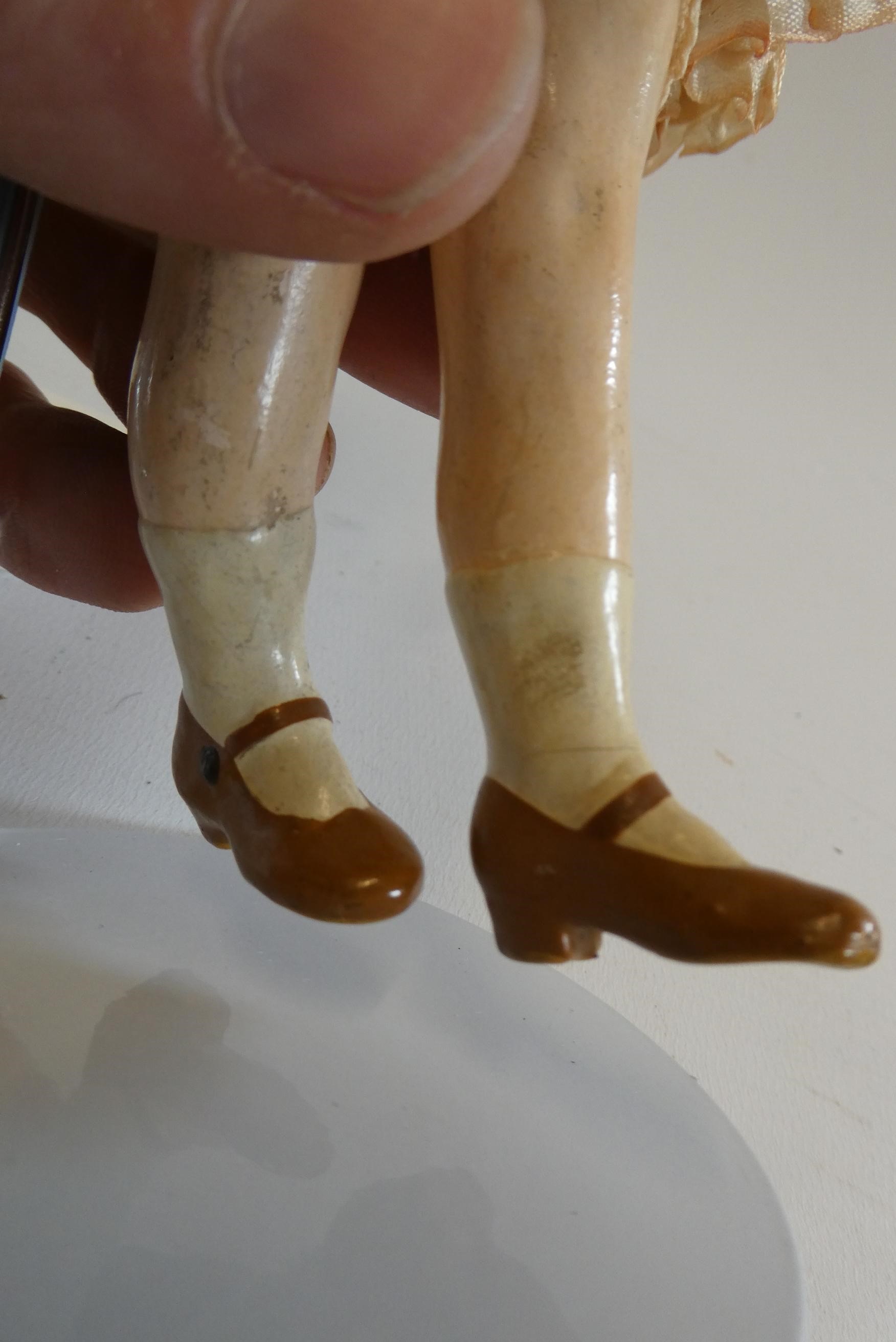 A Simon & Halbig bisque socket head doll Image