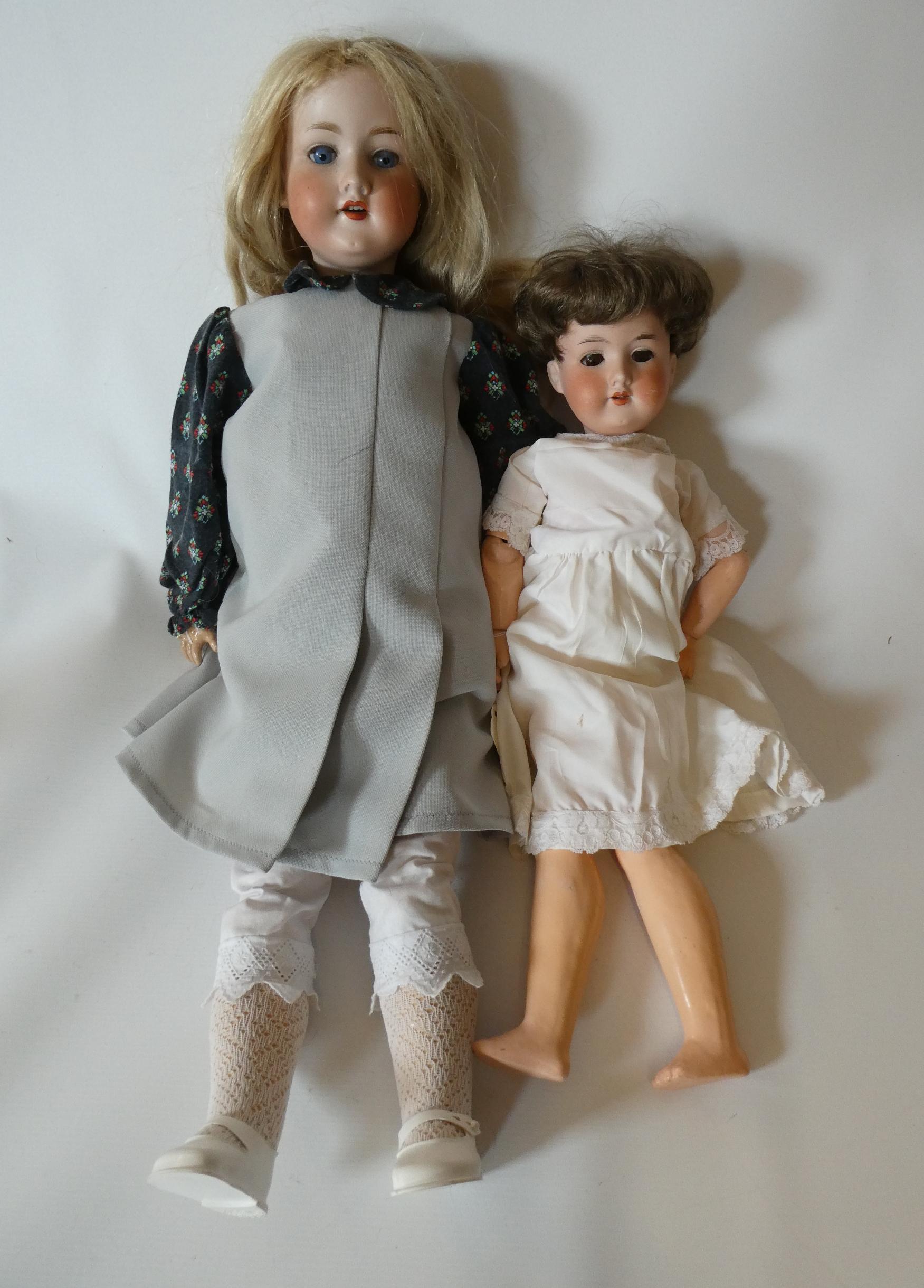 Two Armand Marseille 390 bisque socket head dolls Image