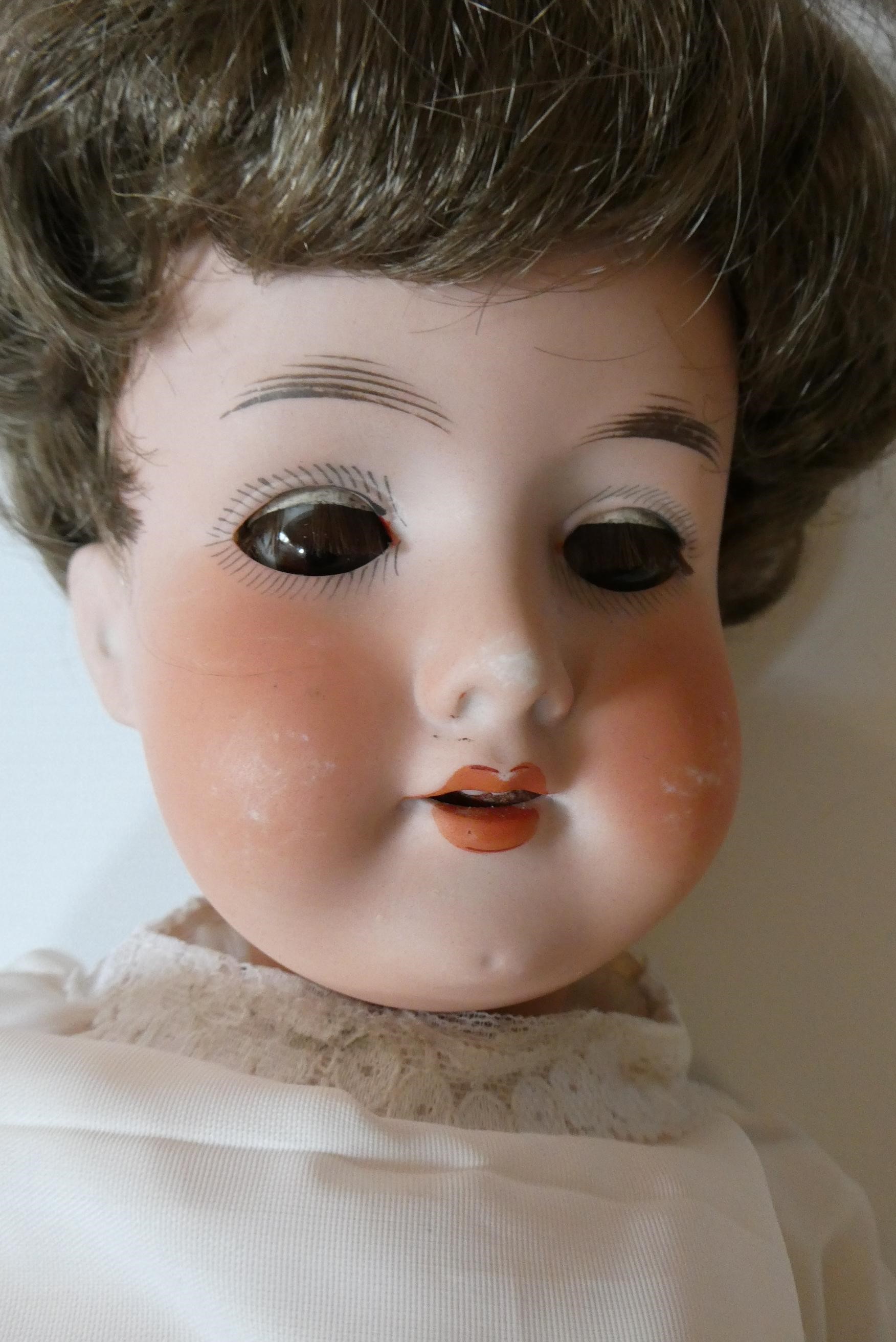 Two Armand Marseille 390 bisque socket head dolls Image