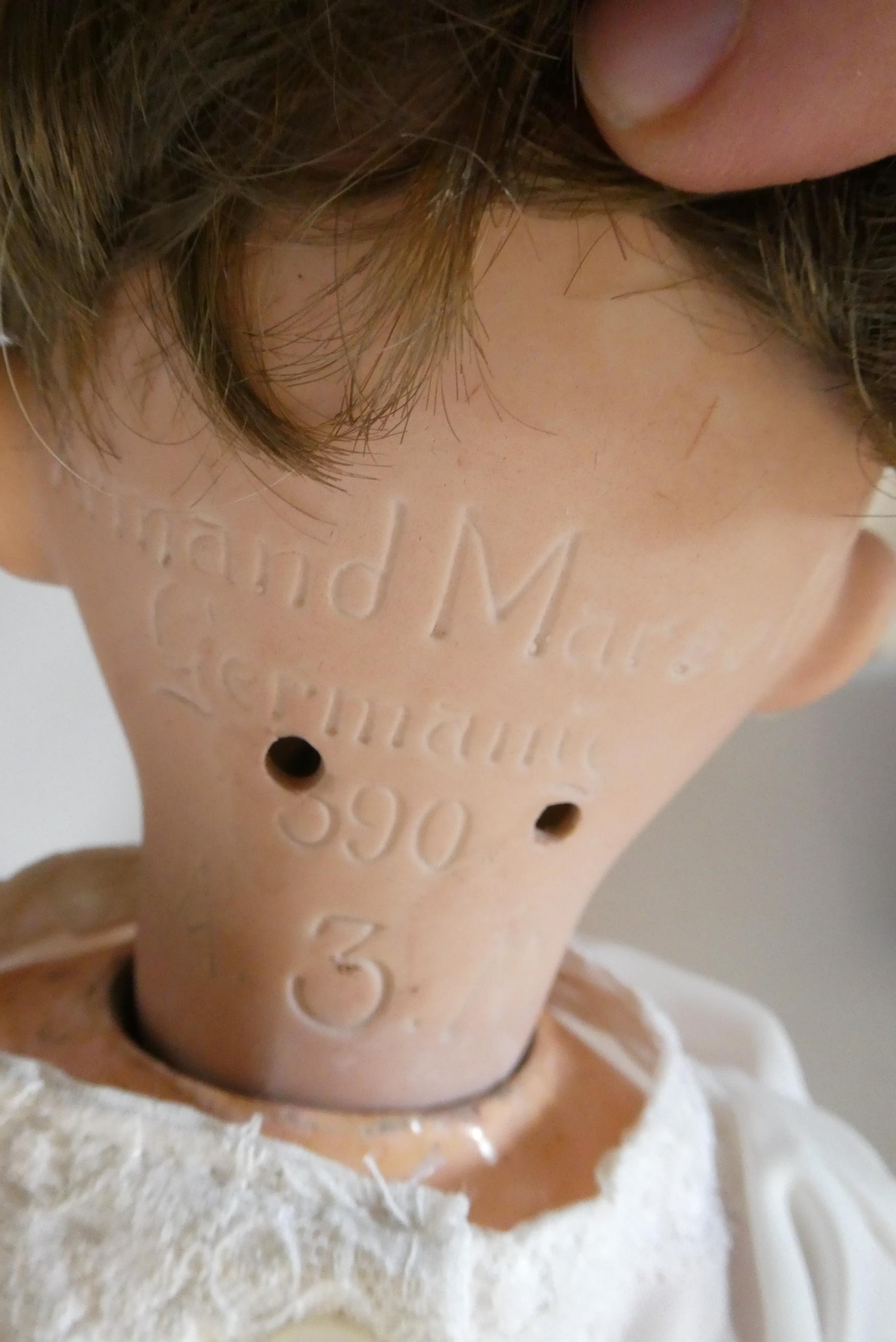 Two Armand Marseille 390 bisque socket head dolls Image