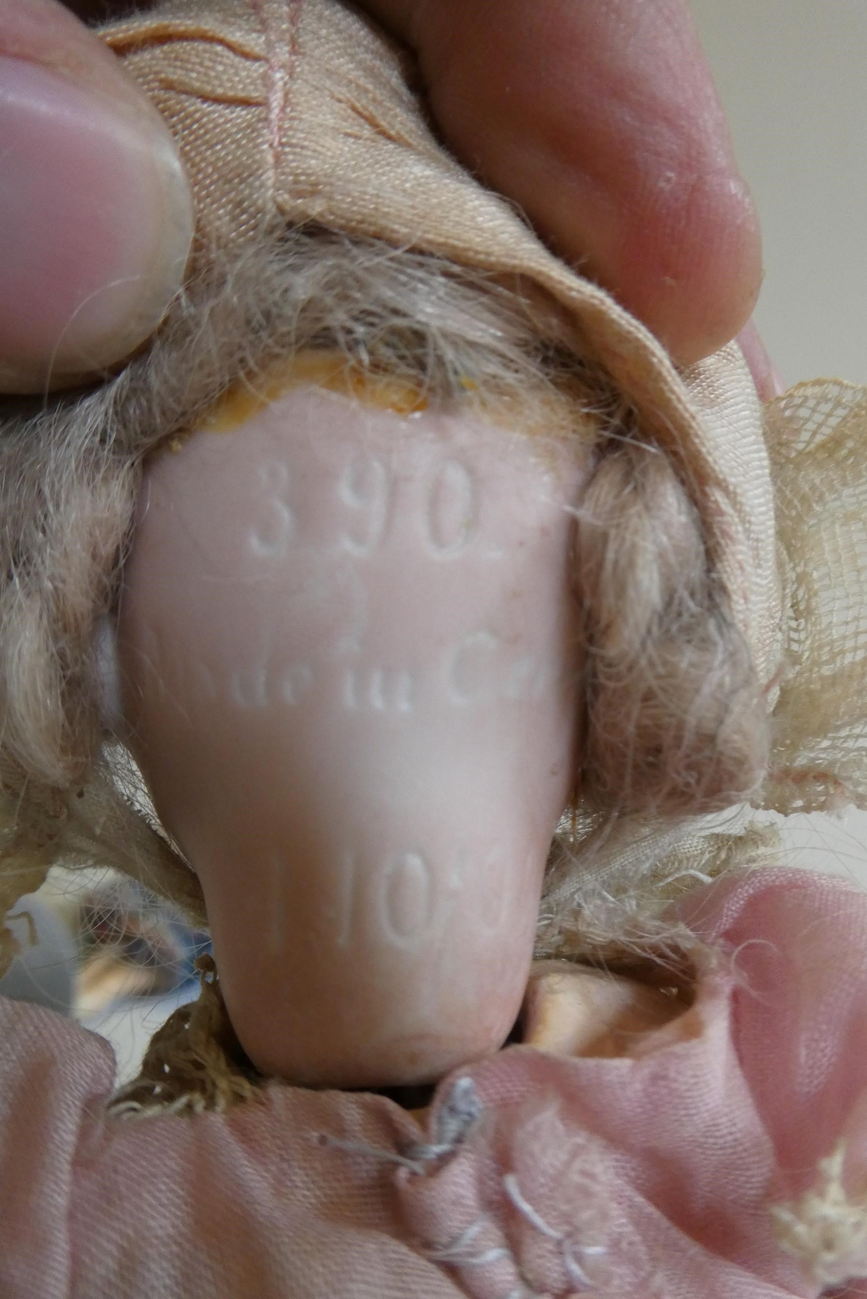 An Armand Marseille bisque socket head doll Image