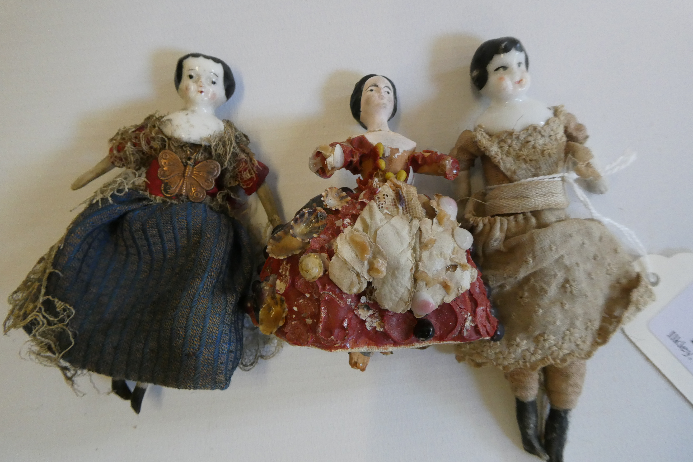 Three Victorian doll's house dolls Image