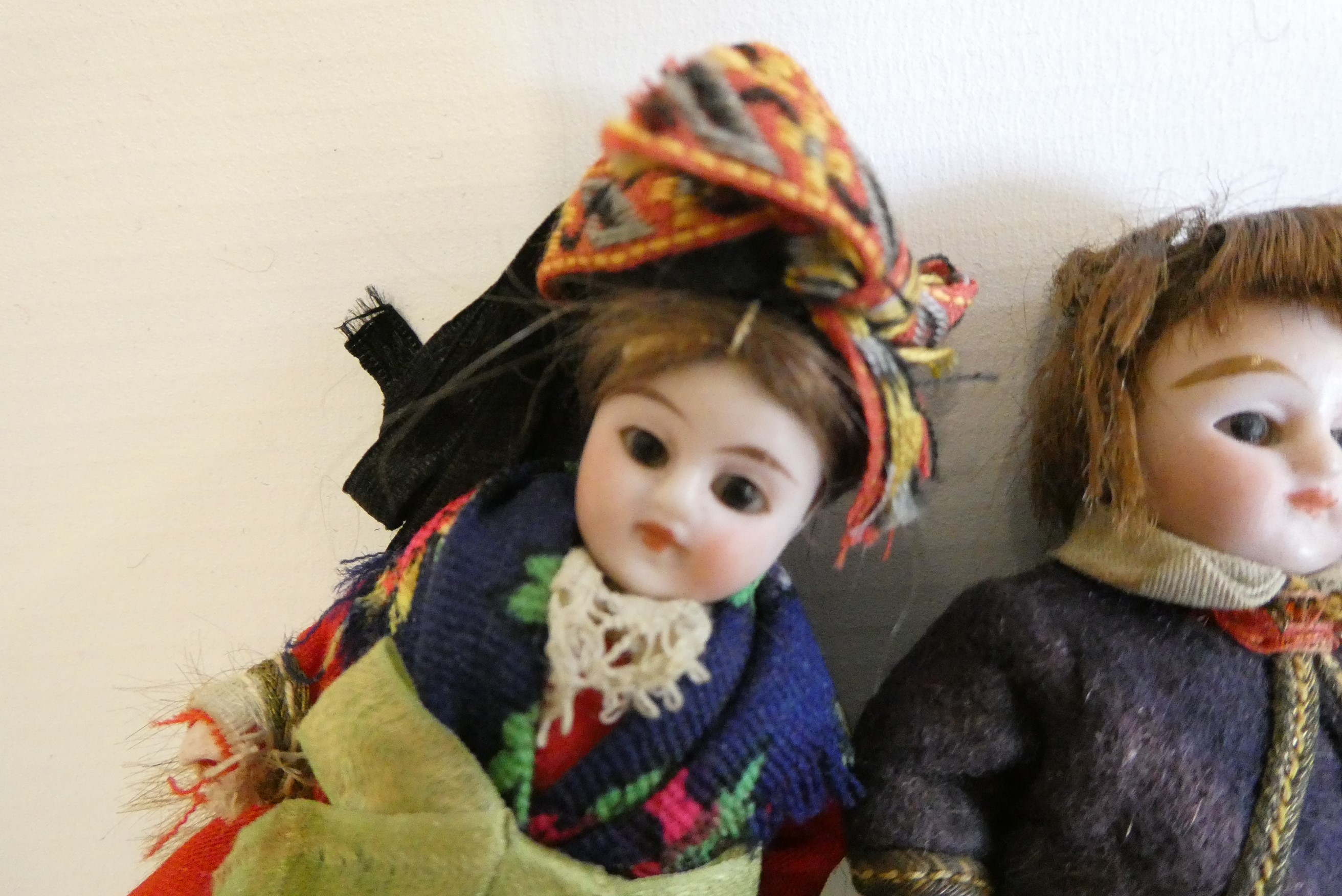 Three all bisque doll's house dolls Image