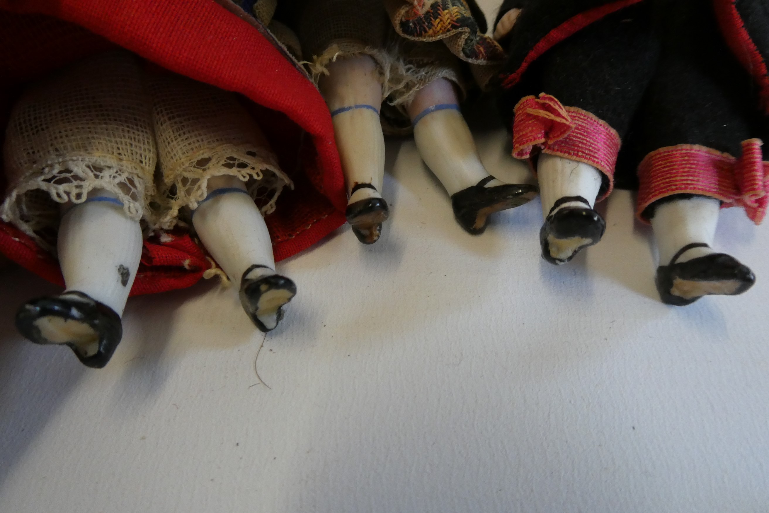 Three all bisque doll's house dolls Image