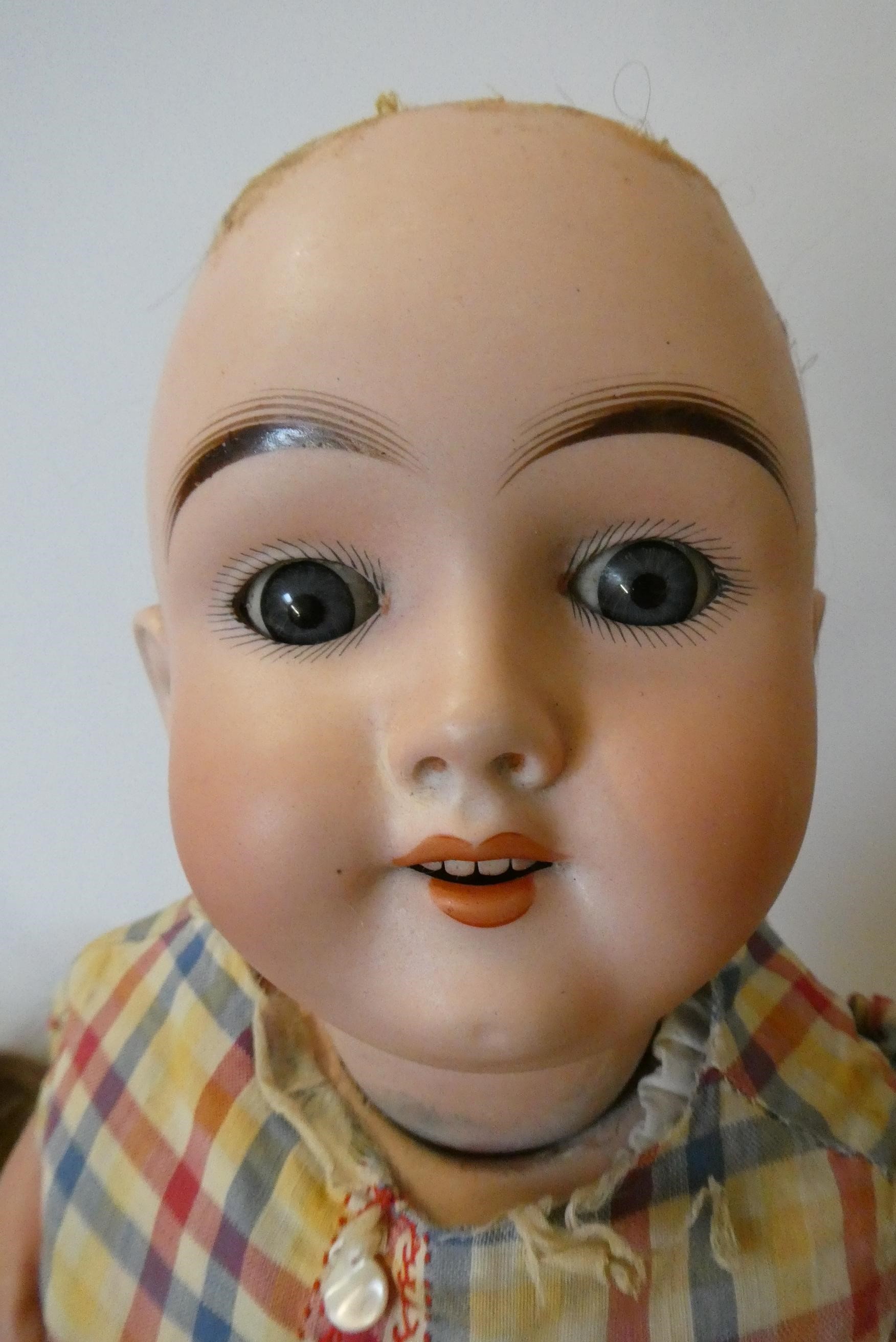 Two German bisque socket head dolls Image