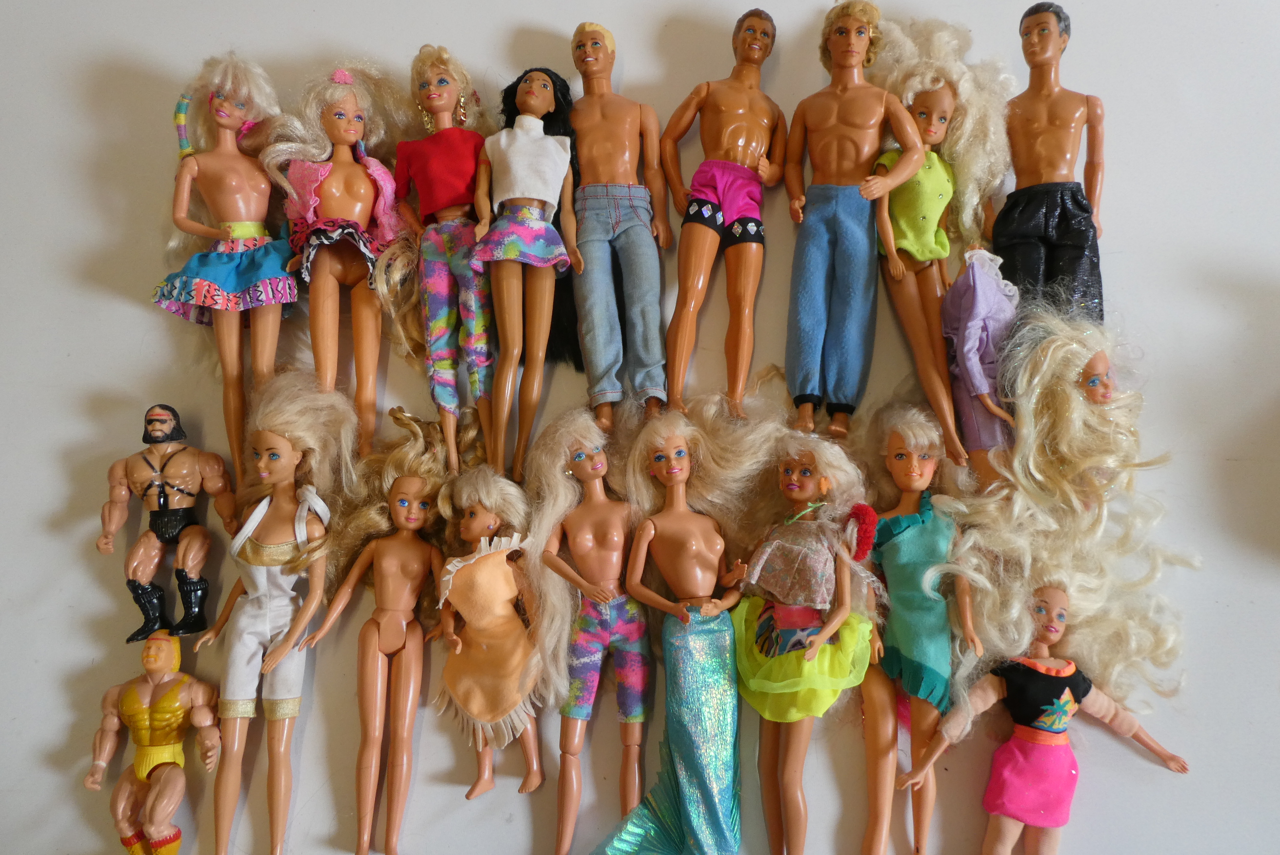 Six Barbie dolls with two Ken dolls, two sisters, nine other dolls, three unassociated horses and Image