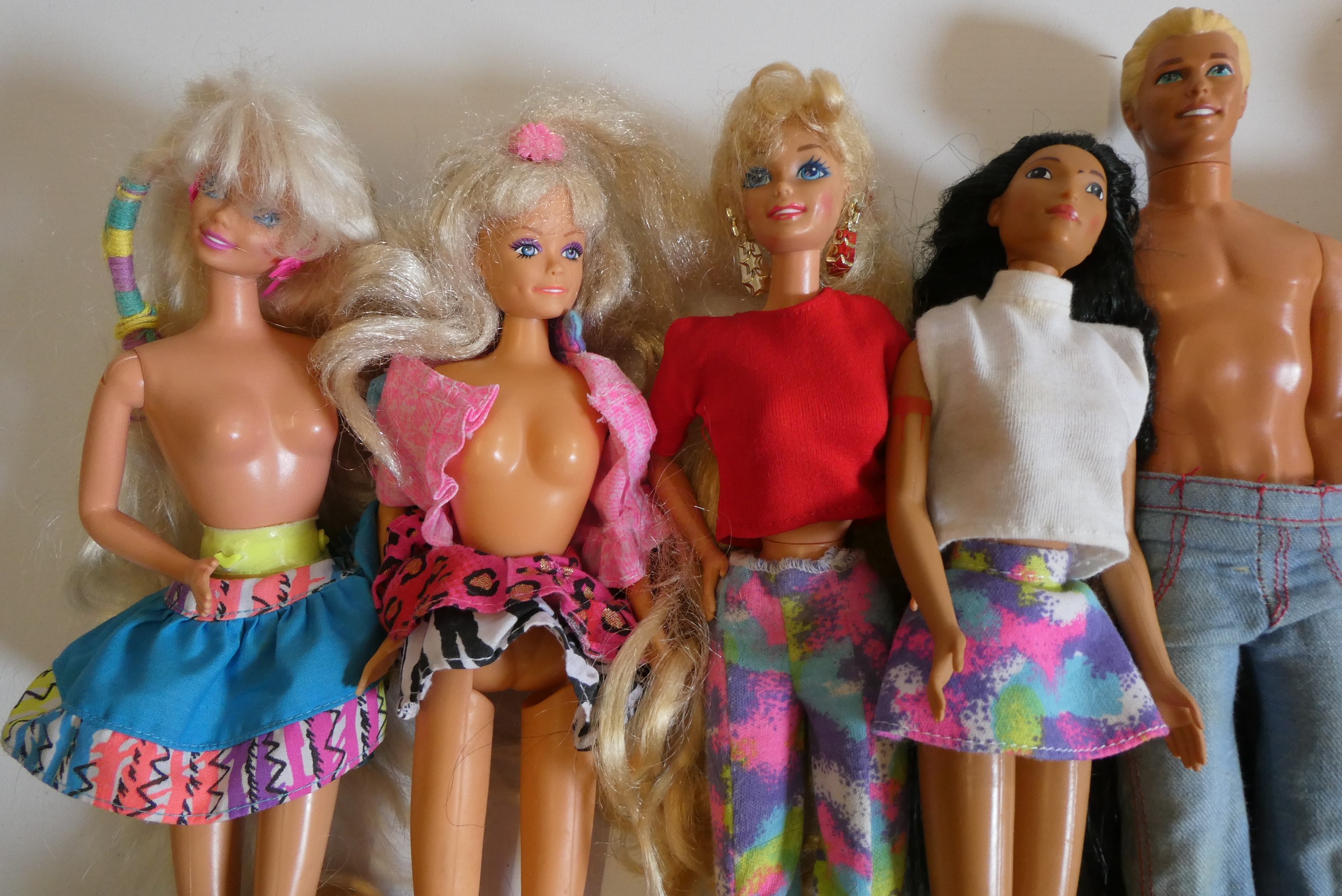 Six Barbie dolls with two Ken dolls, two sisters, nine other dolls, three unassociated horses and Image