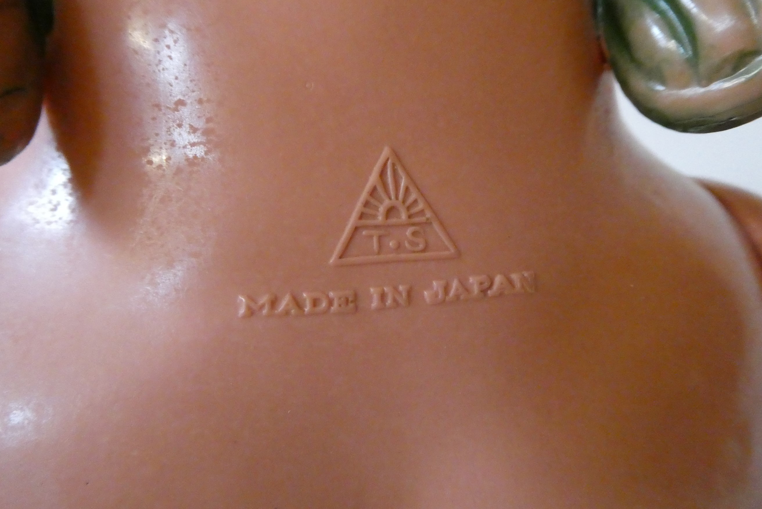 Three large Kewpie type dolls, one 26" celluloid doll, a 17 1/2" composition girl and a 13 1/2" Image