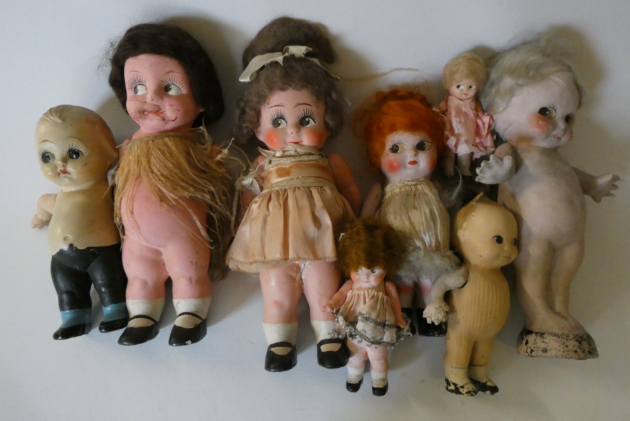 Seven Kewpie type composition dolls, all with jointed shoulders, largest 11" tall (Est. plus 24% Image