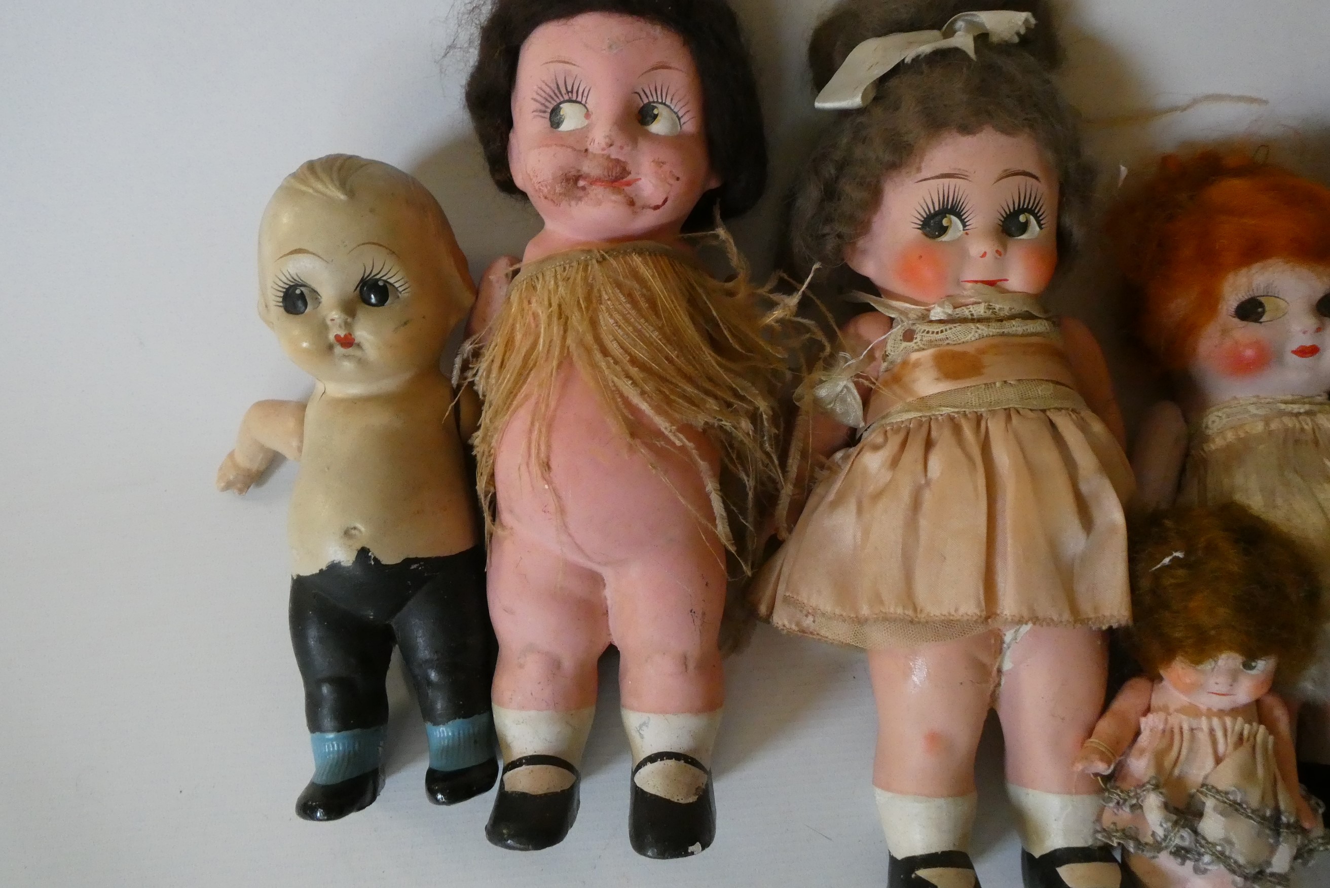 Seven Kewpie type composition dolls, all with jointed shoulders, largest 11" tall (Est. plus 24% Image