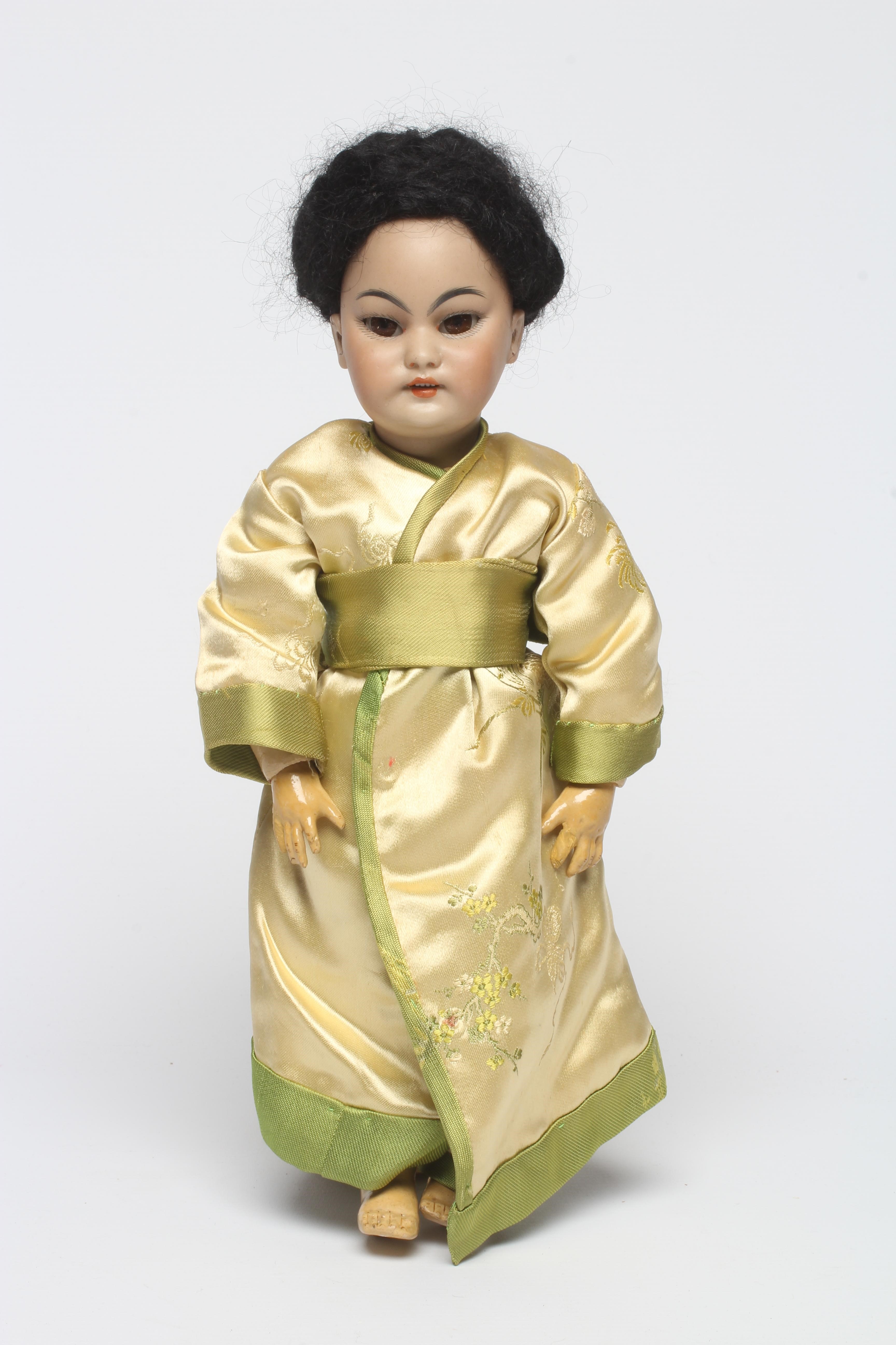A Simon & Halbig bisque socket head Asian girl doll Image