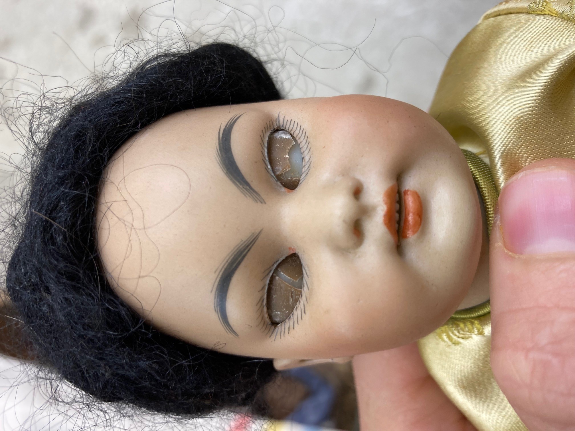 A Simon & Halbig bisque socket head Asian girl doll Image