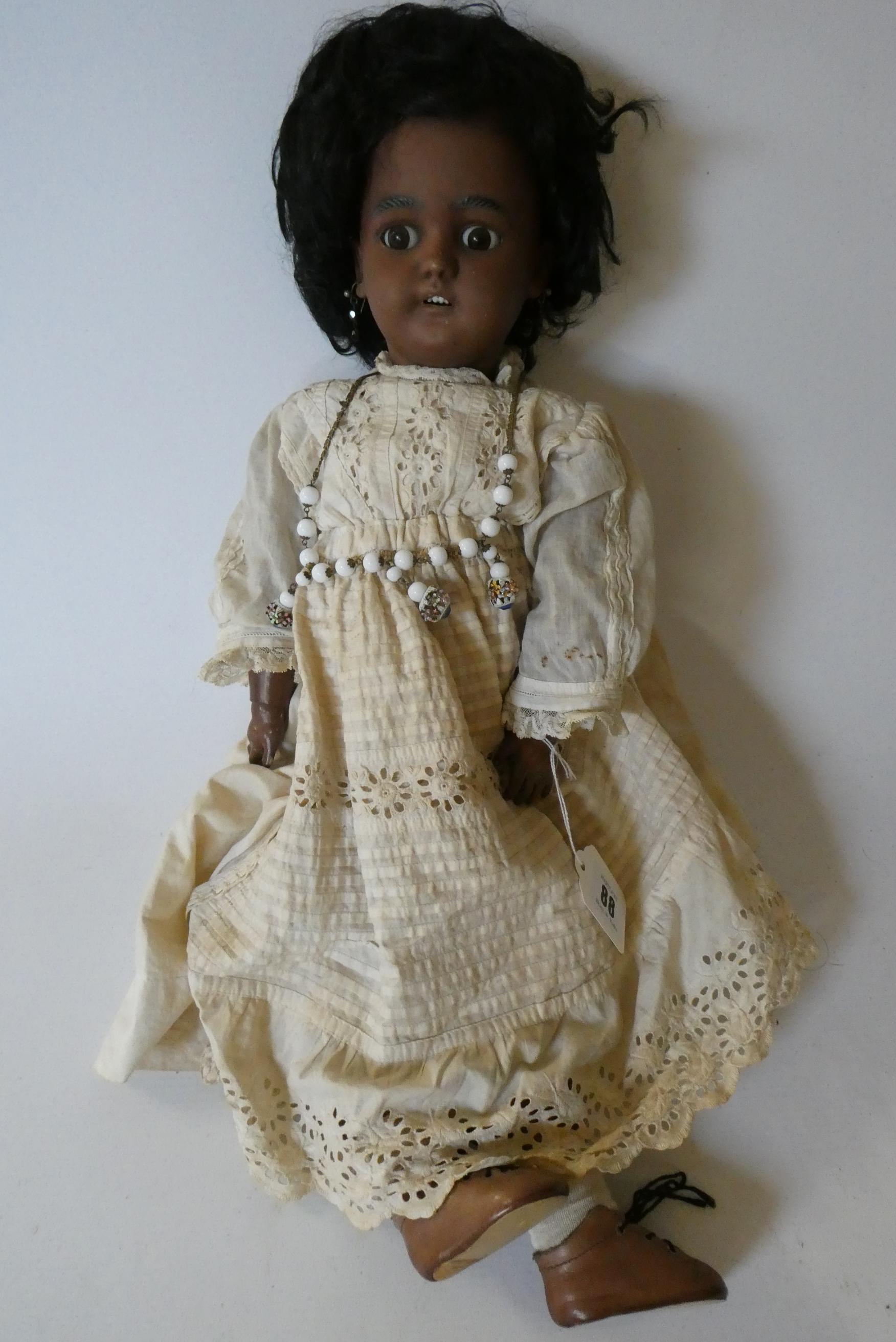 A Simon & Halbig bisque socket head girl doll Image