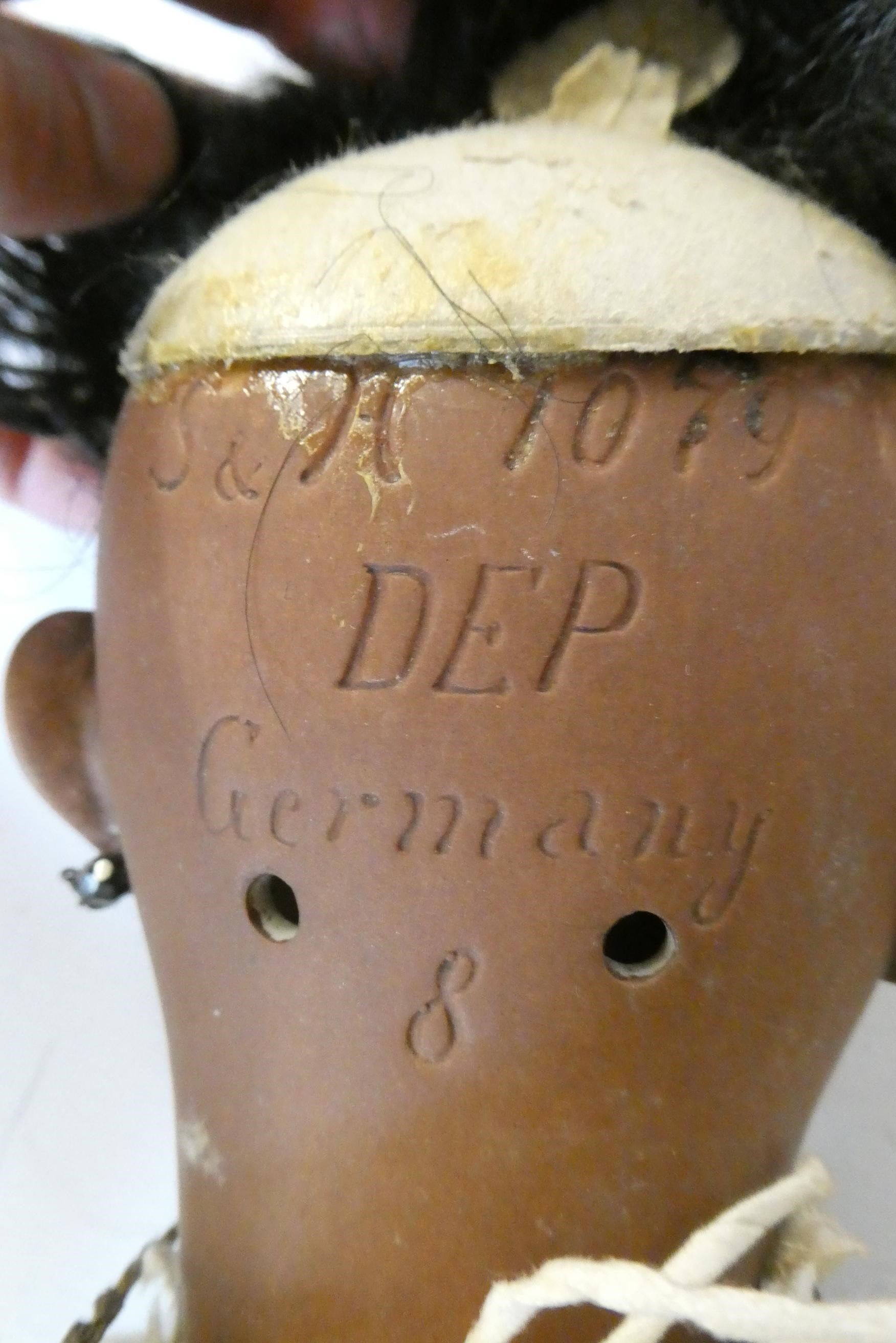 A Simon & Halbig bisque socket head girl doll Image