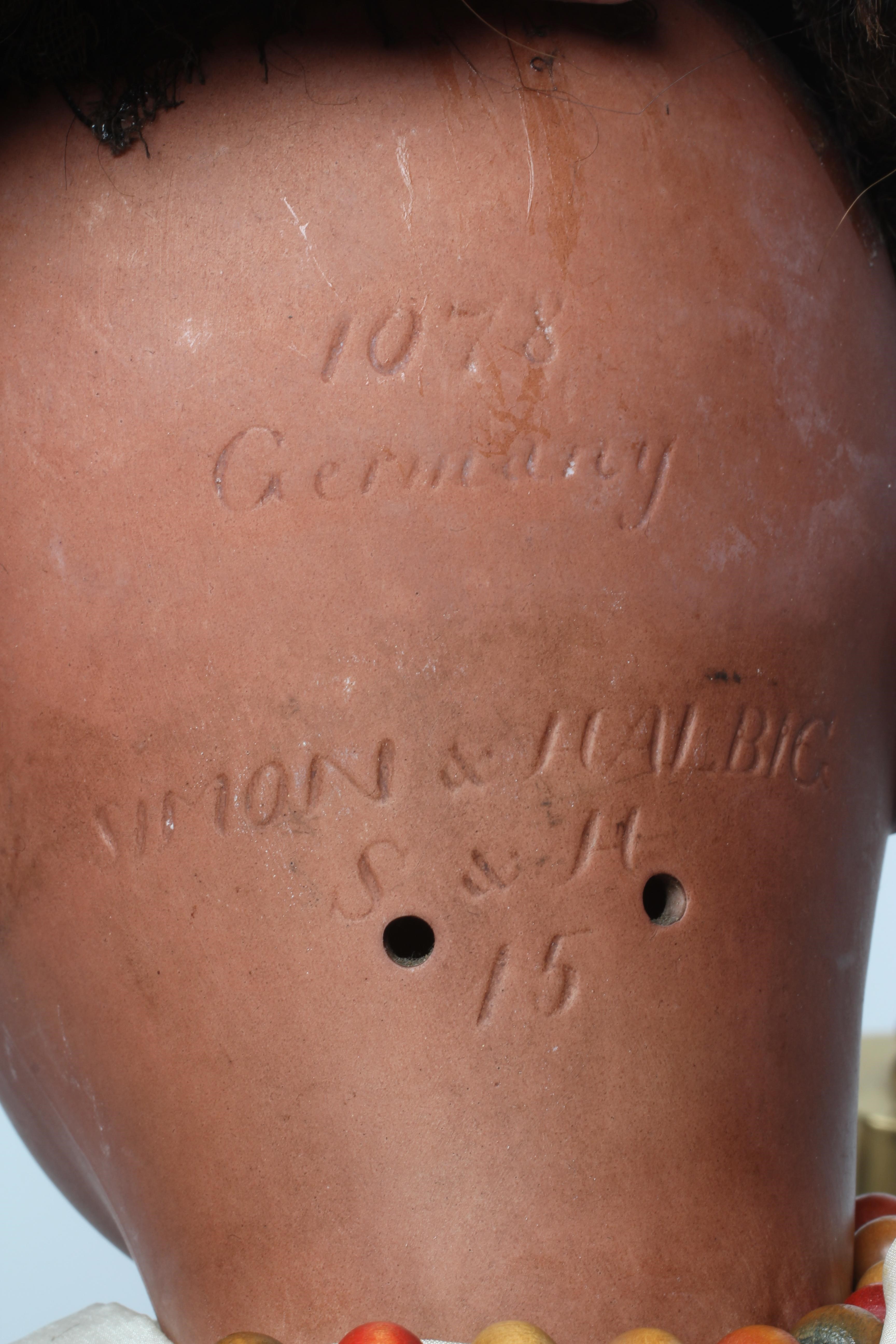 A large Simon & Halbig bisque socket head doll Image