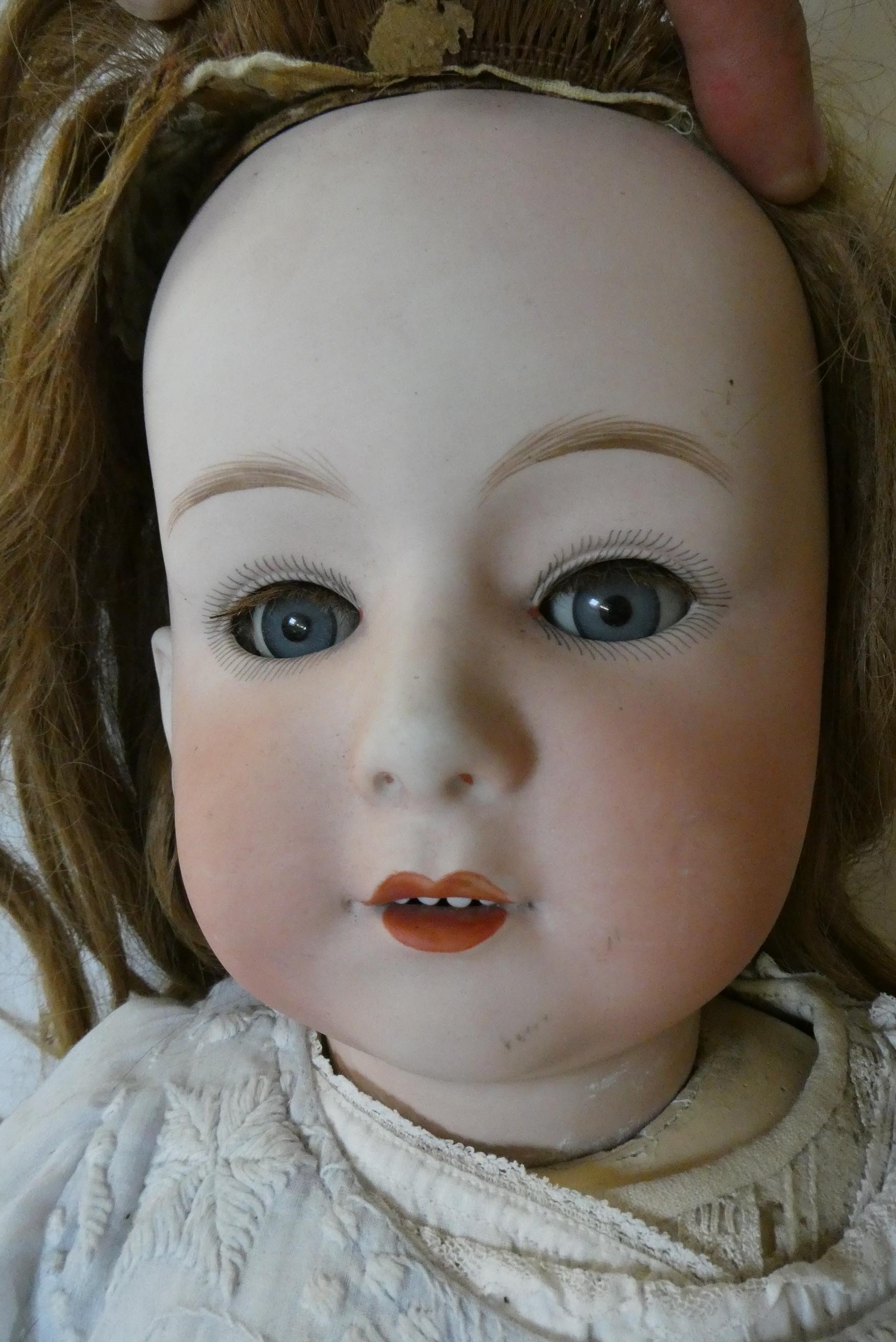 A Heubach bisque socket head doll Image