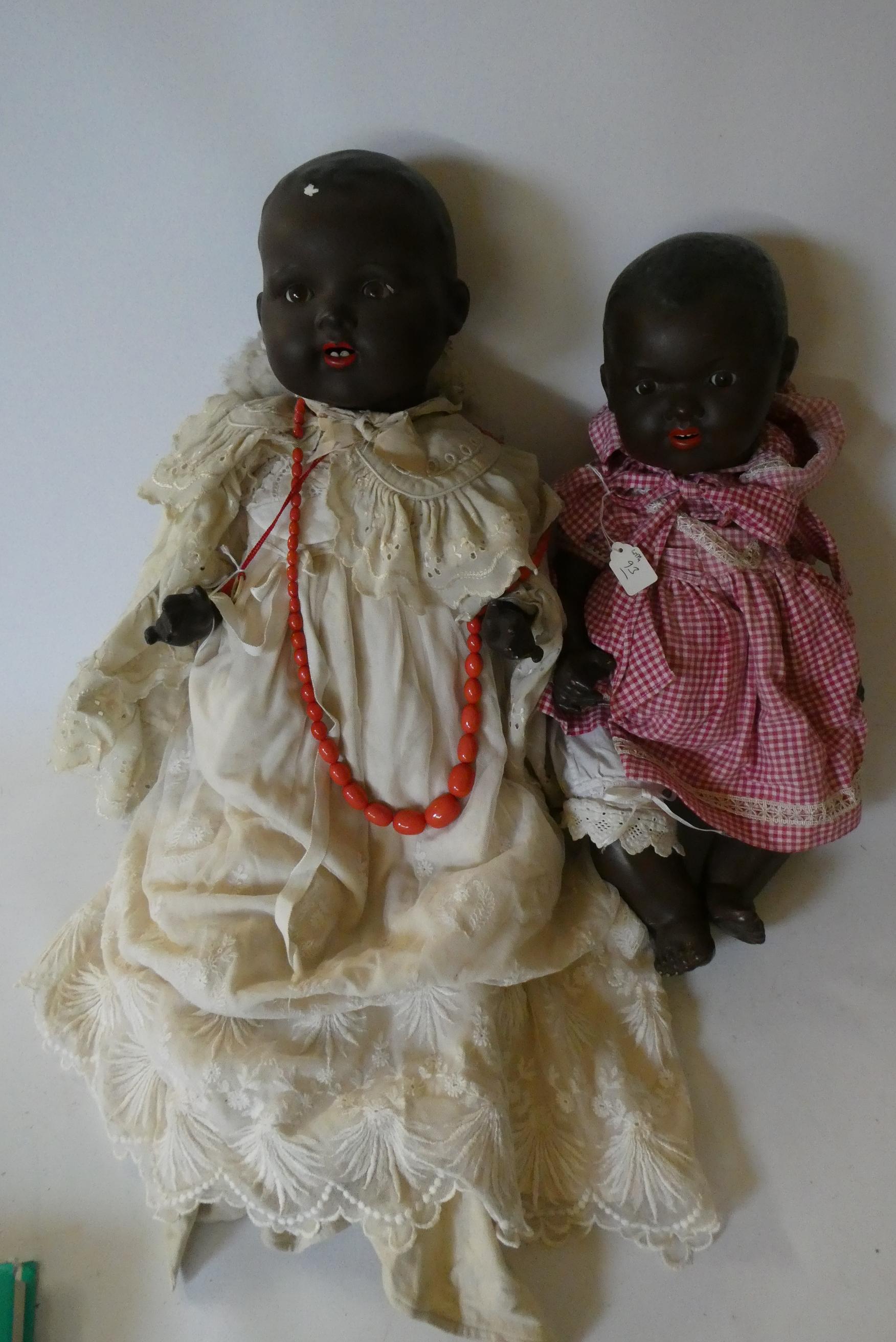 Two Armand Marseille bisque socket head baby dolls, one 24" 351/10K with sleeping eyes and open Image