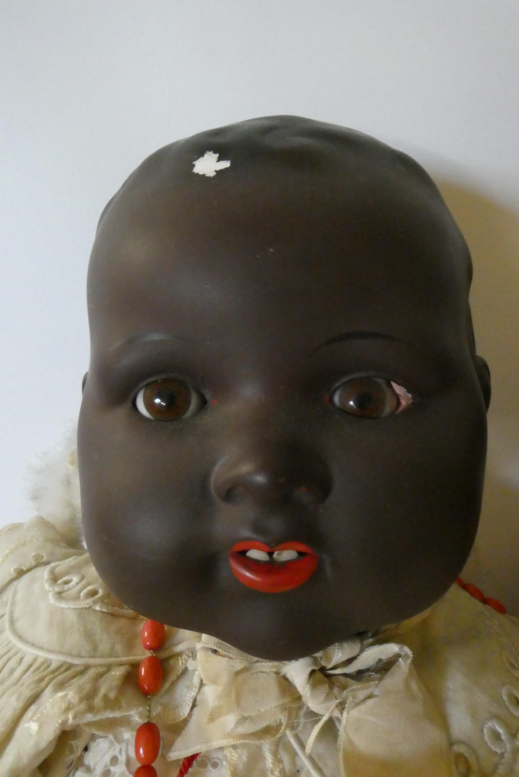 Two Armand Marseille bisque socket head baby dolls, one 24" 351/10K with sleeping eyes and open Image