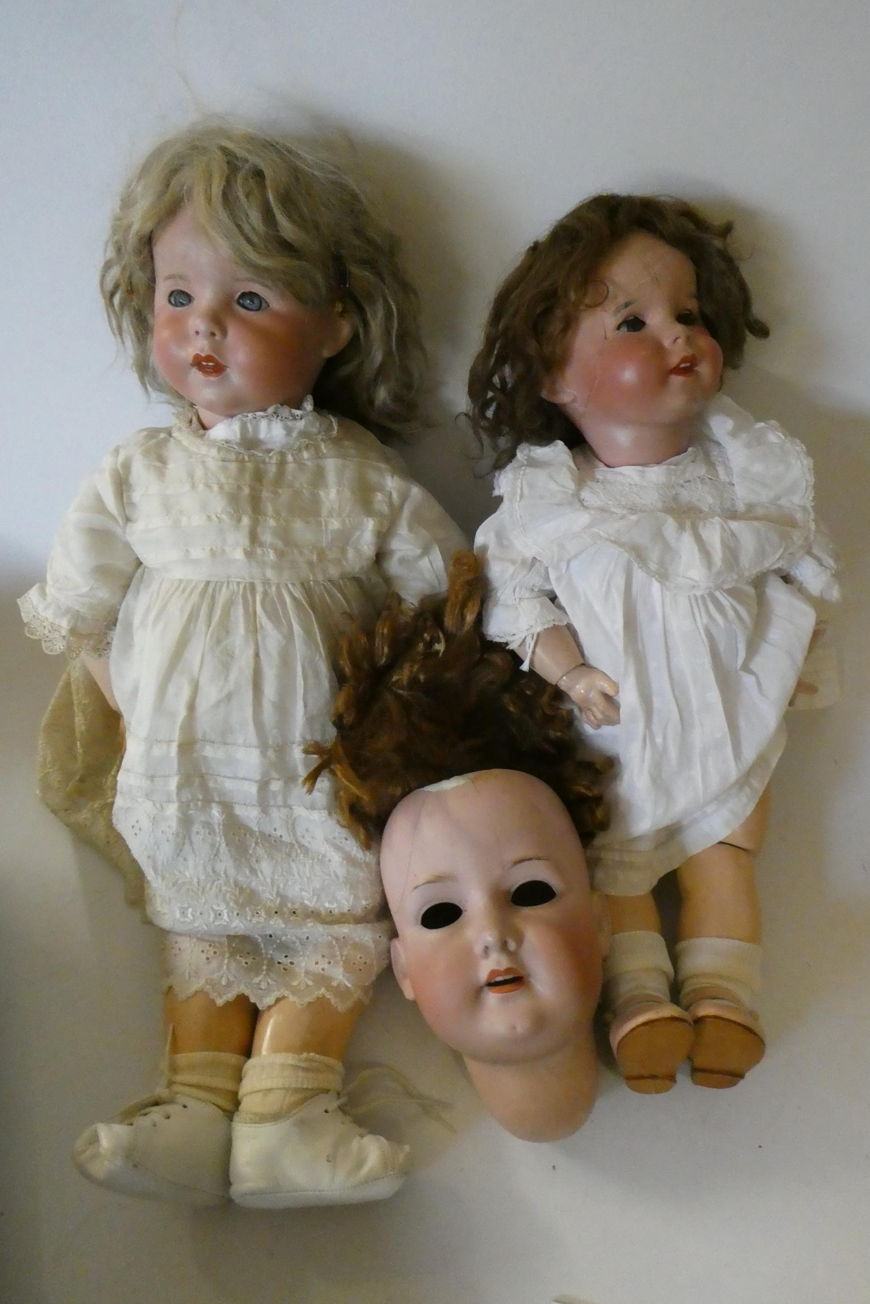 Two restored bisque SFBJ socket head dolls Image