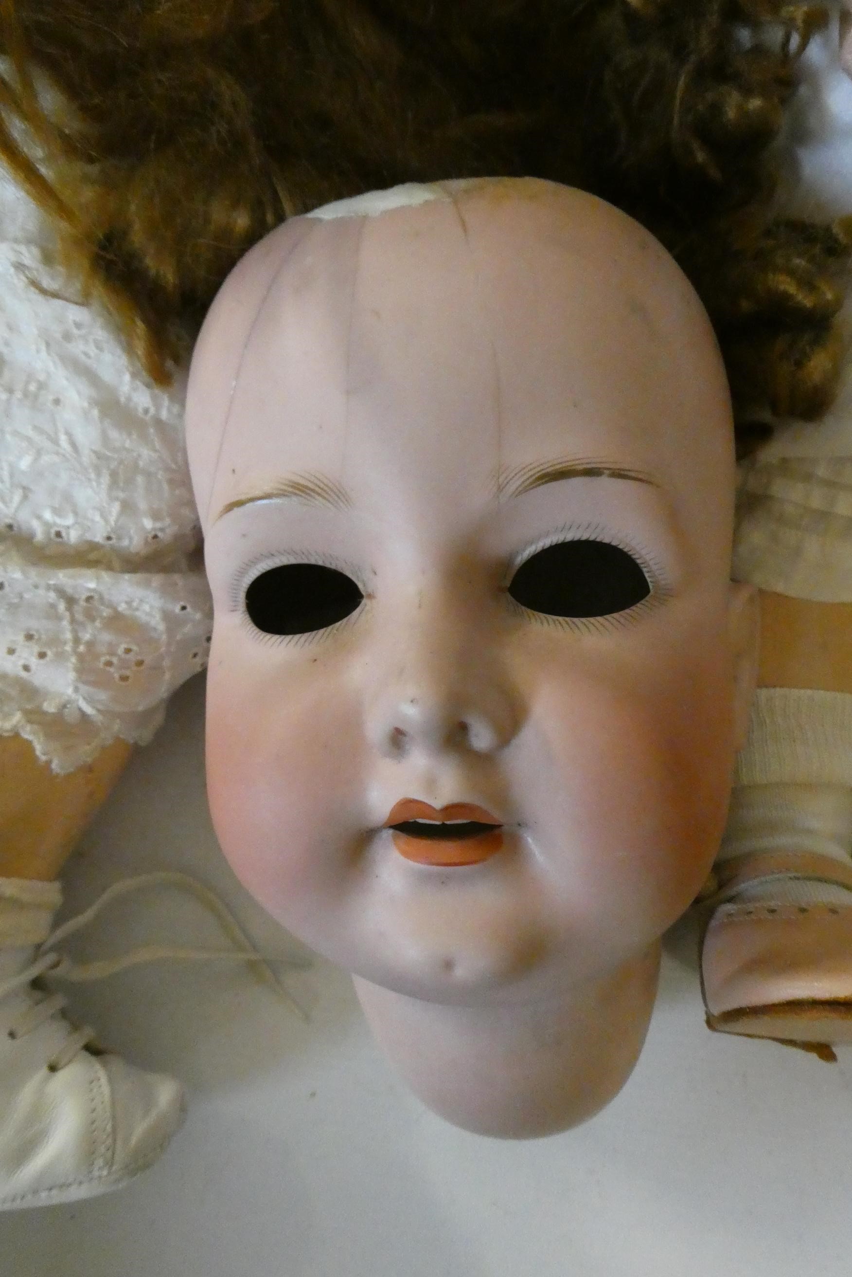 Two restored bisque SFBJ socket head dolls Image