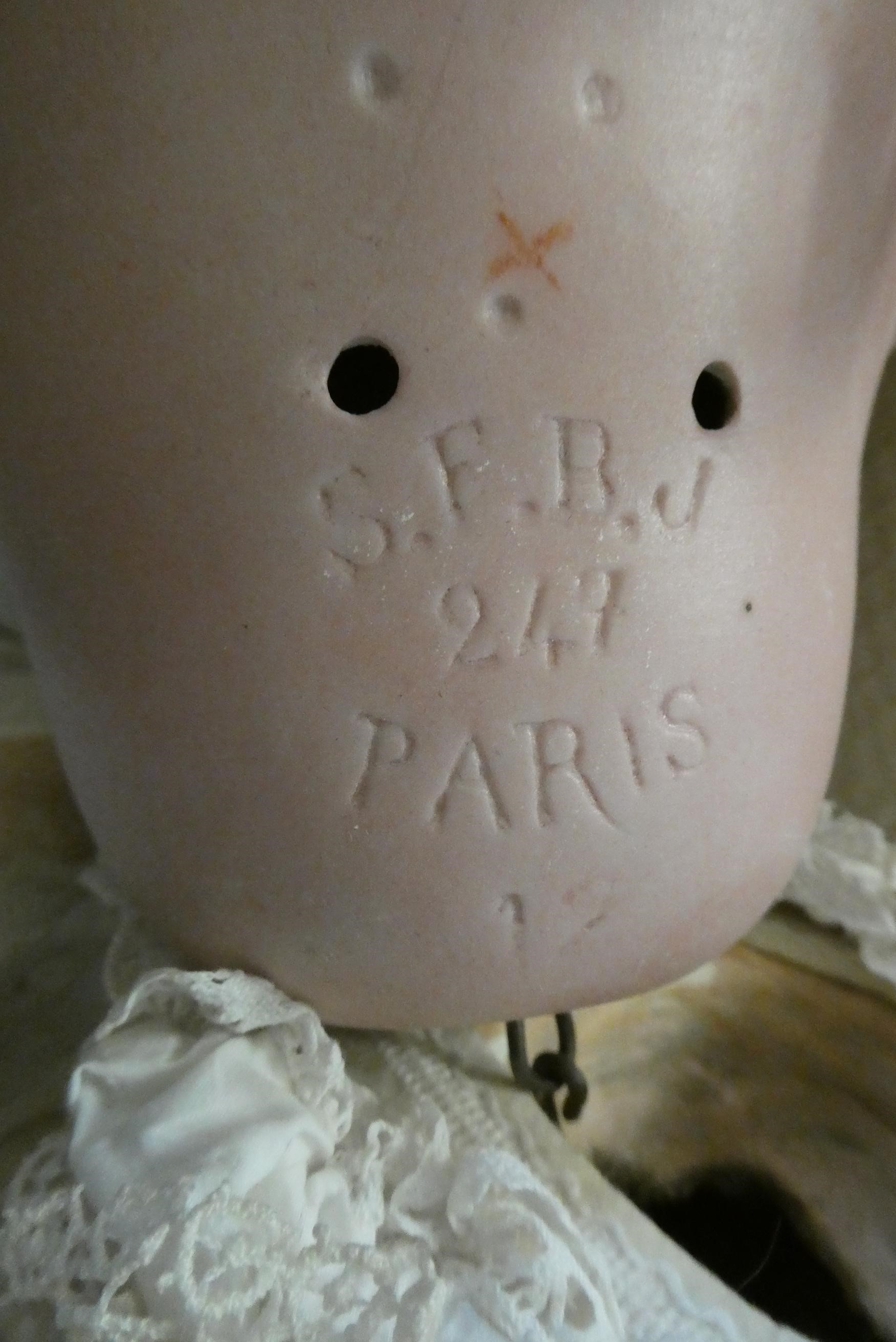 Two restored bisque SFBJ socket head dolls Image