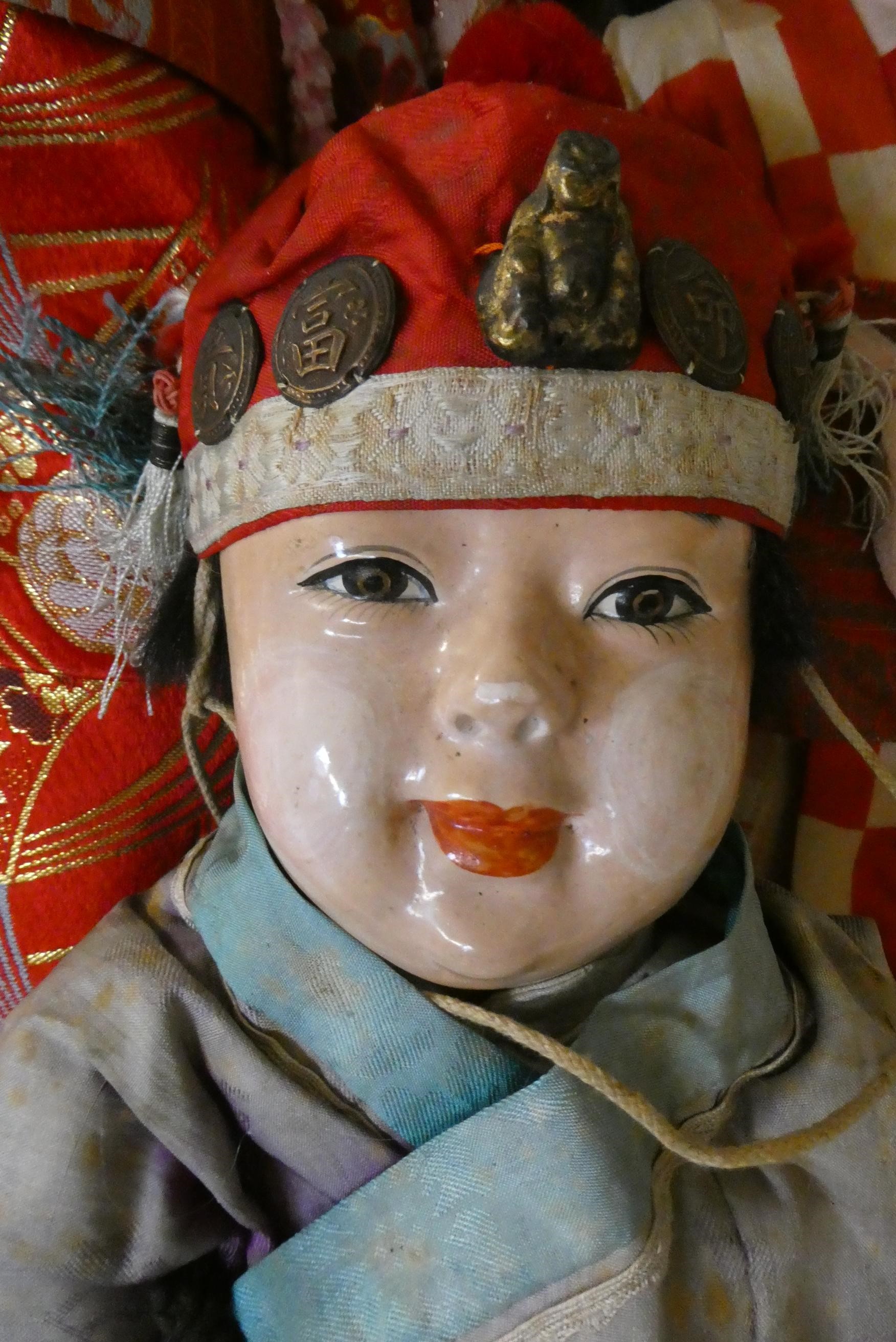 Four composition Asian dolls Image