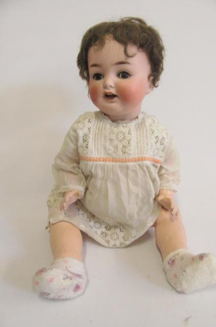 An Ernst Heubach bisque head character doll with cry Image