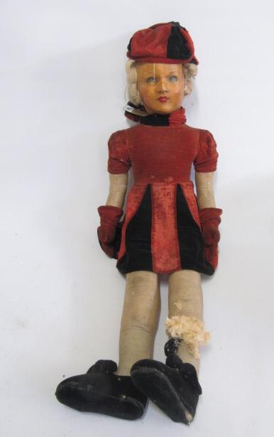 A large Deans style fabric covered doll with painted face Image