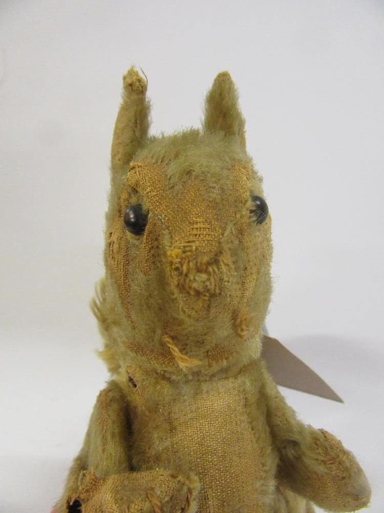 A stuffed squirrel Image
