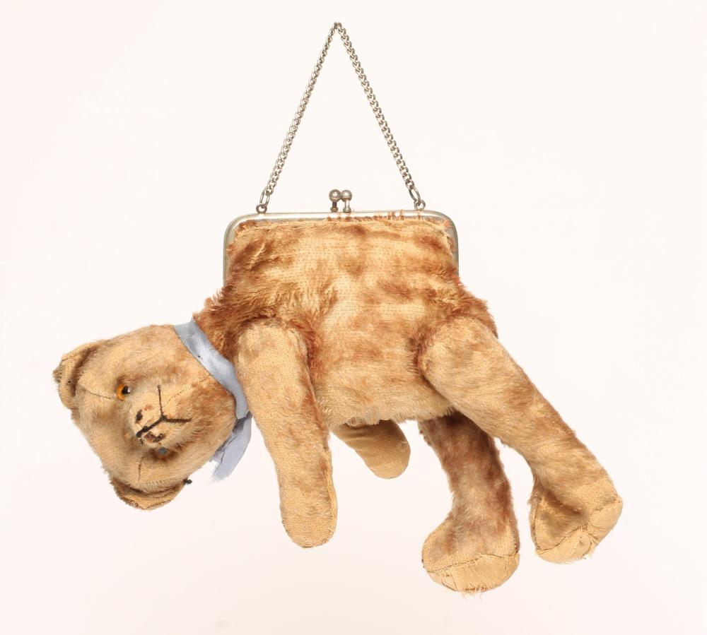An unusual purse-bear Image