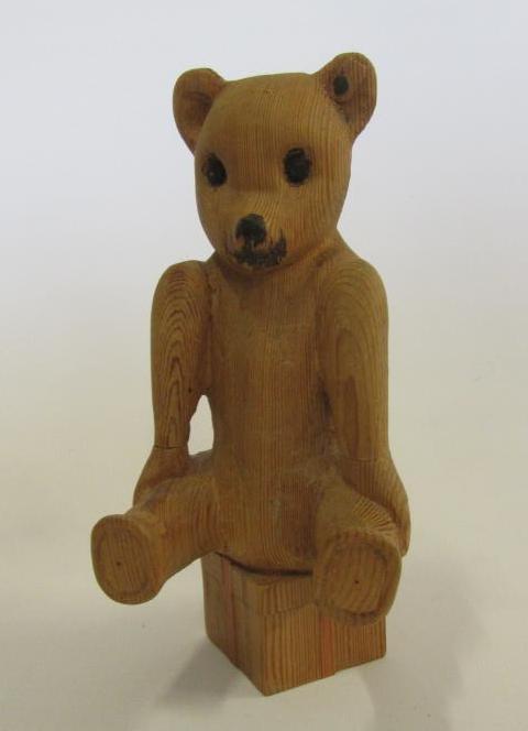 A pine wood teddy bear Image