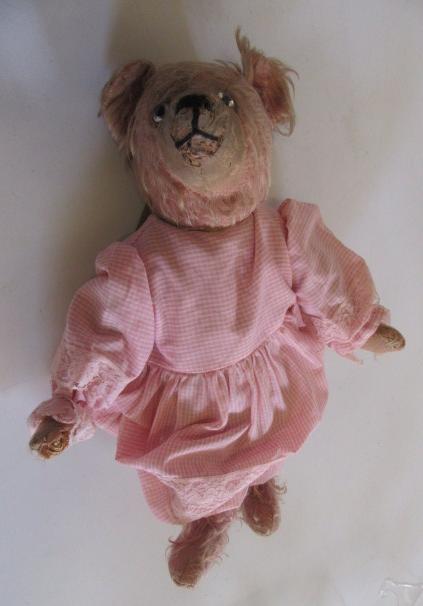 A teddy bear pre-war in pink plush Image