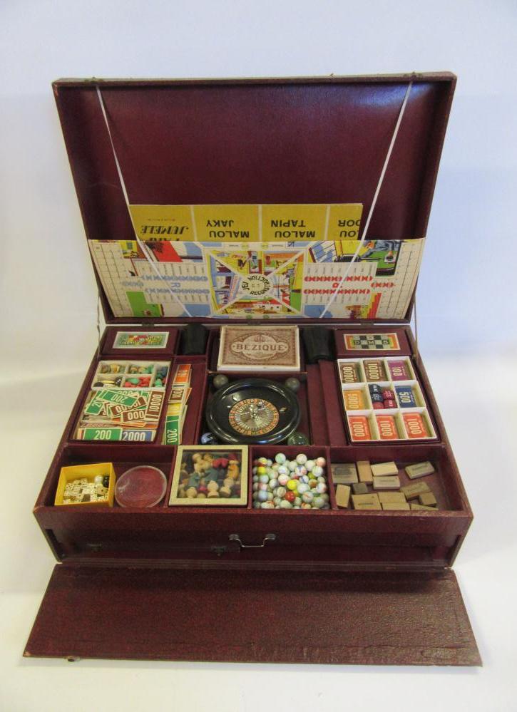 A French mid 20th century games compendium with paper covered wood box containing a large number of Image