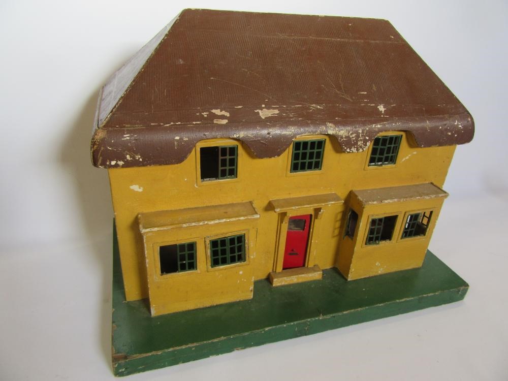 A dolls thatched cottage Image