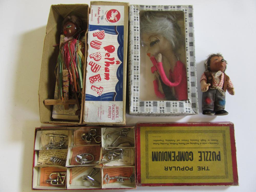 A Pelham string puppet "Mambo" in box with blue/pink label Image