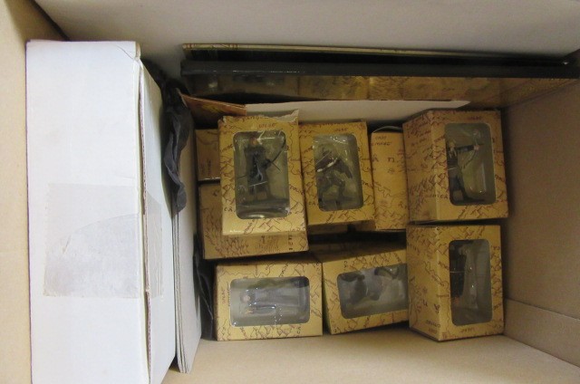 A collection of twenty nine Lord of the Rings figures by New Line Cinema Inc. Image