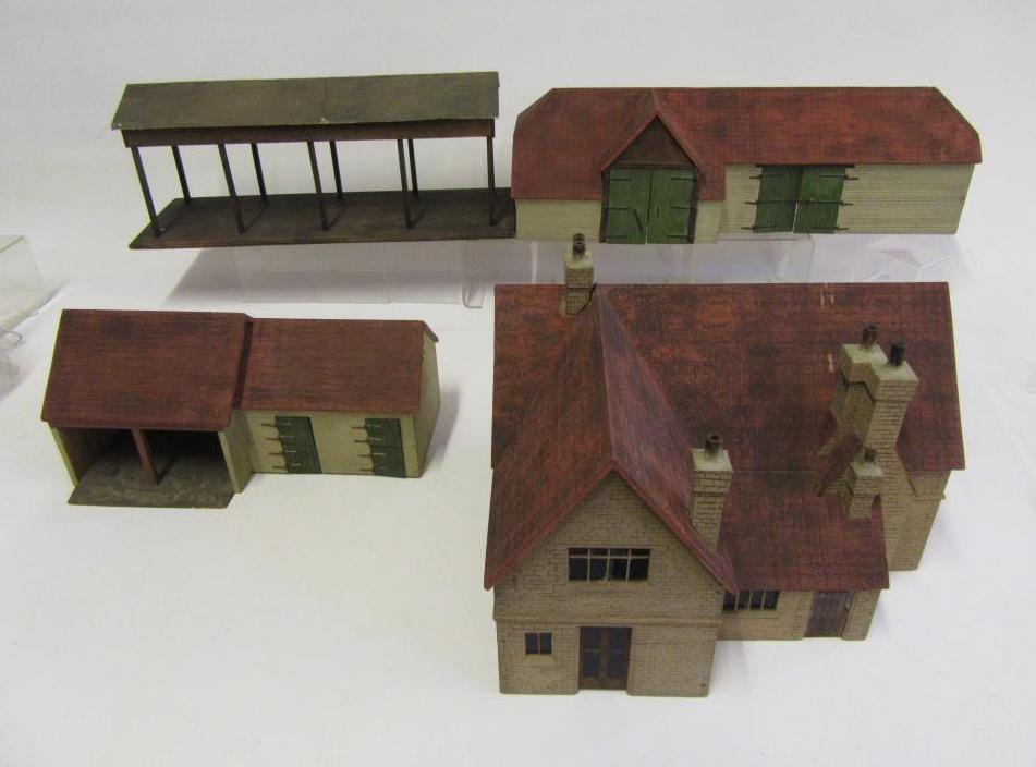 A set of scratch built farmhouse and buildings to accompany the previous lot in painted wood Image