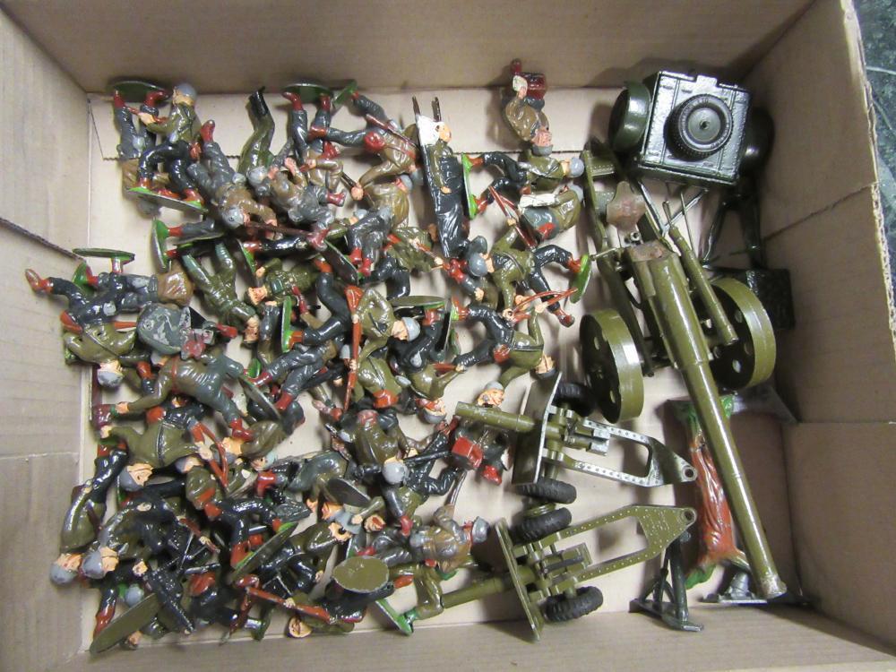 Approximately fifty Britains and other metal World War II figures Image