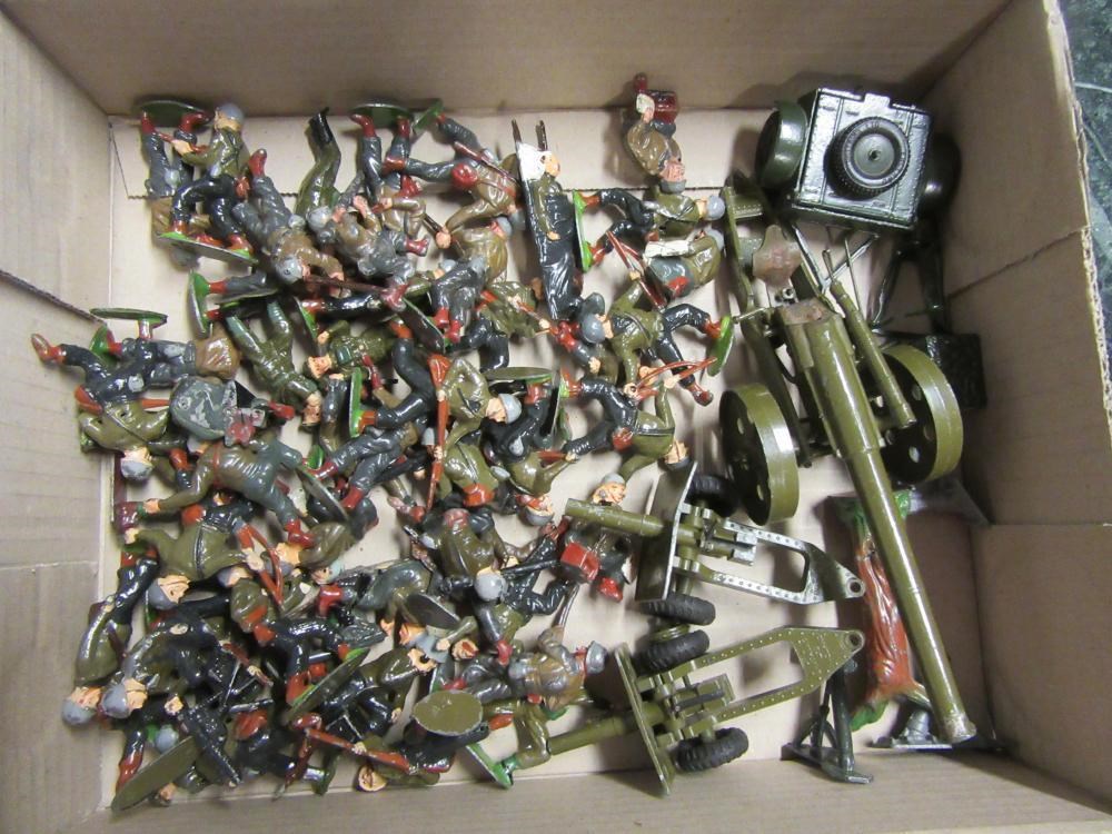 Approximately fifty Britains and other metal World War II figures Image