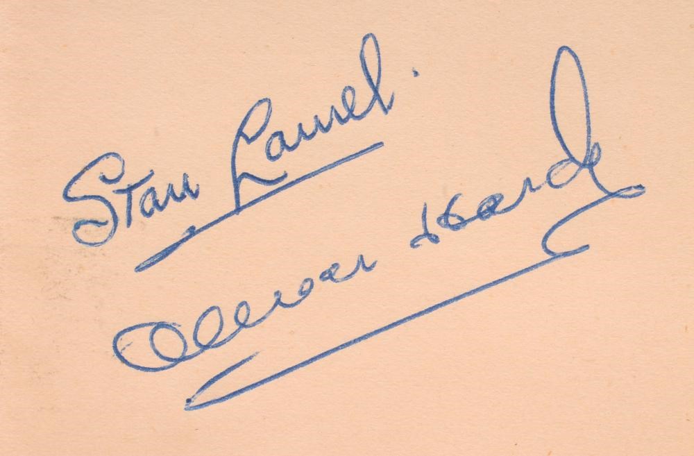 Stan Laurel and Oliver Hardy autographs in album also containing:- Wilfred Pickles Image