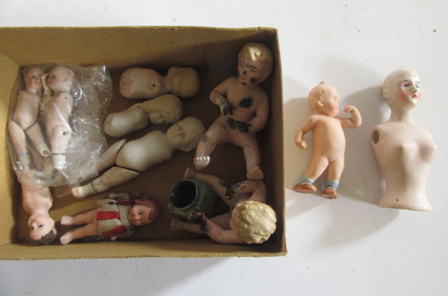 Twelve all bisque dolls Image